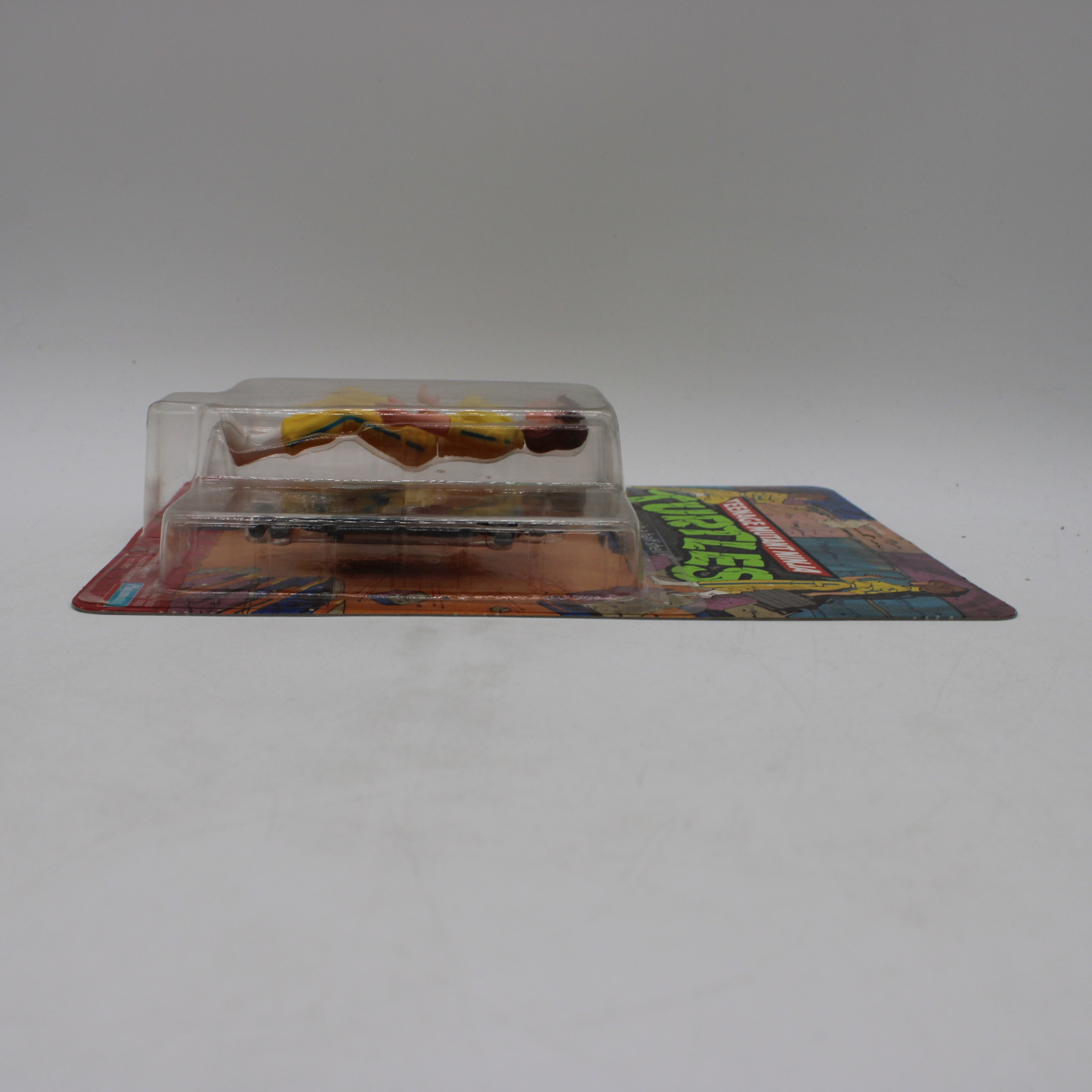 April O'Neil with Gun/Camcorder Teenage Mutant Ninja Turtles Action Figure