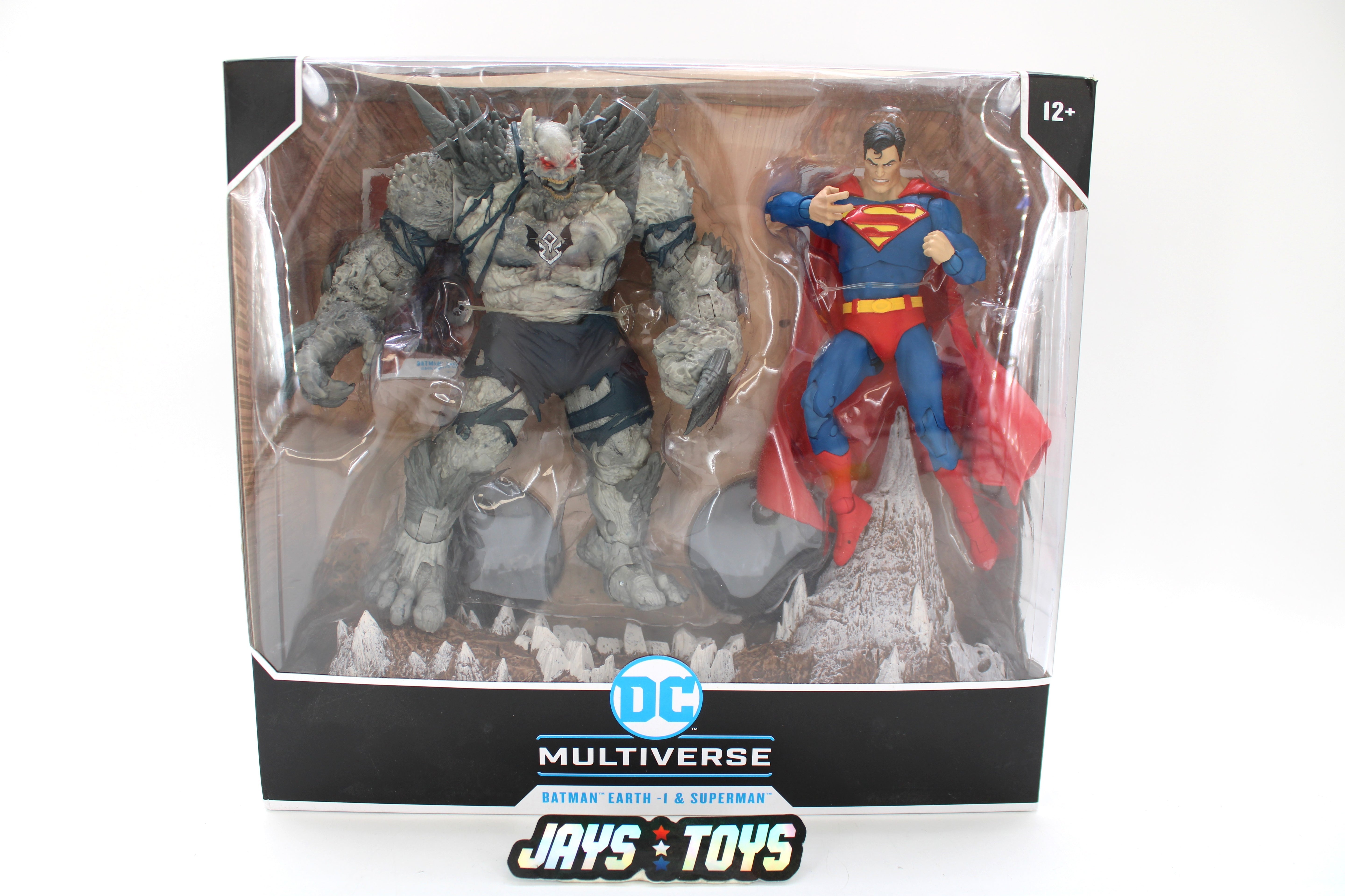 Batman Earth -1 & Superman DC Multiverse 2-Pack — Box Front View with Diorama Base