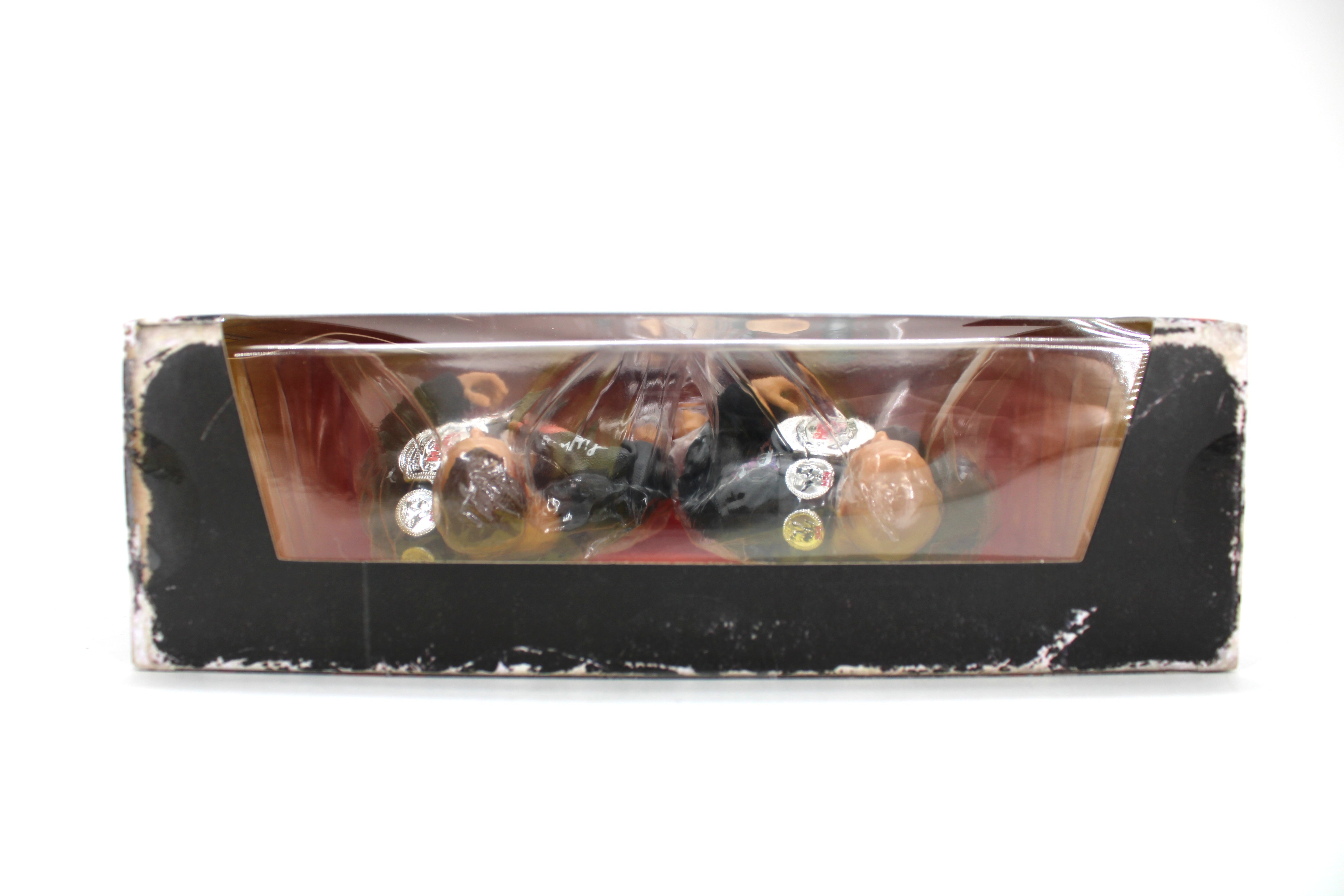 FTR Living Legends 2-Pack Cash Wheeler Dax Harwood — Bottom View Showing Figures and Championship Belts in Tray Through Window