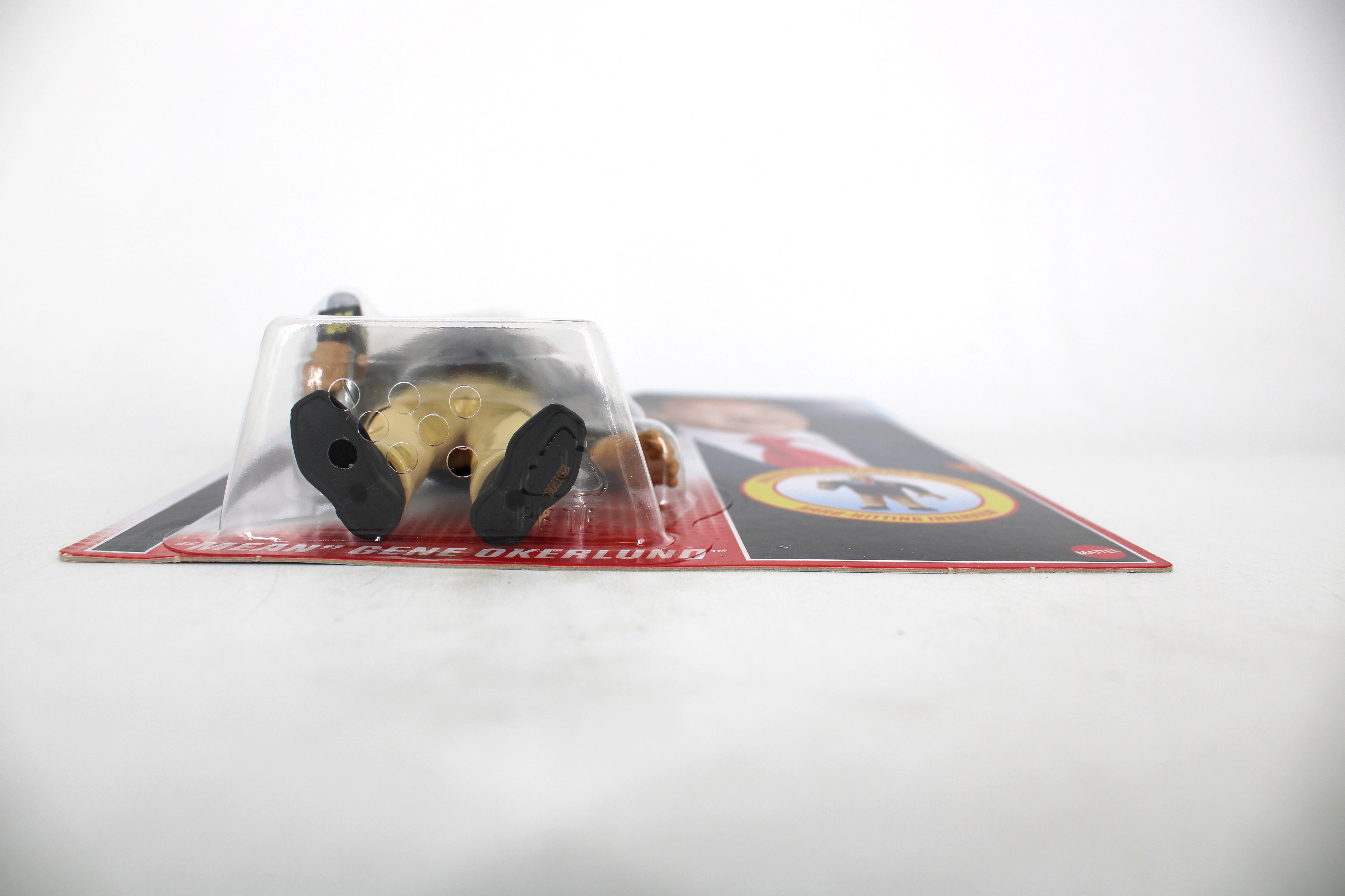 "Mean" Gene Okerlund WWE Official Retros Action Figure — Figure Detail Showing Boot Soles and Bubble