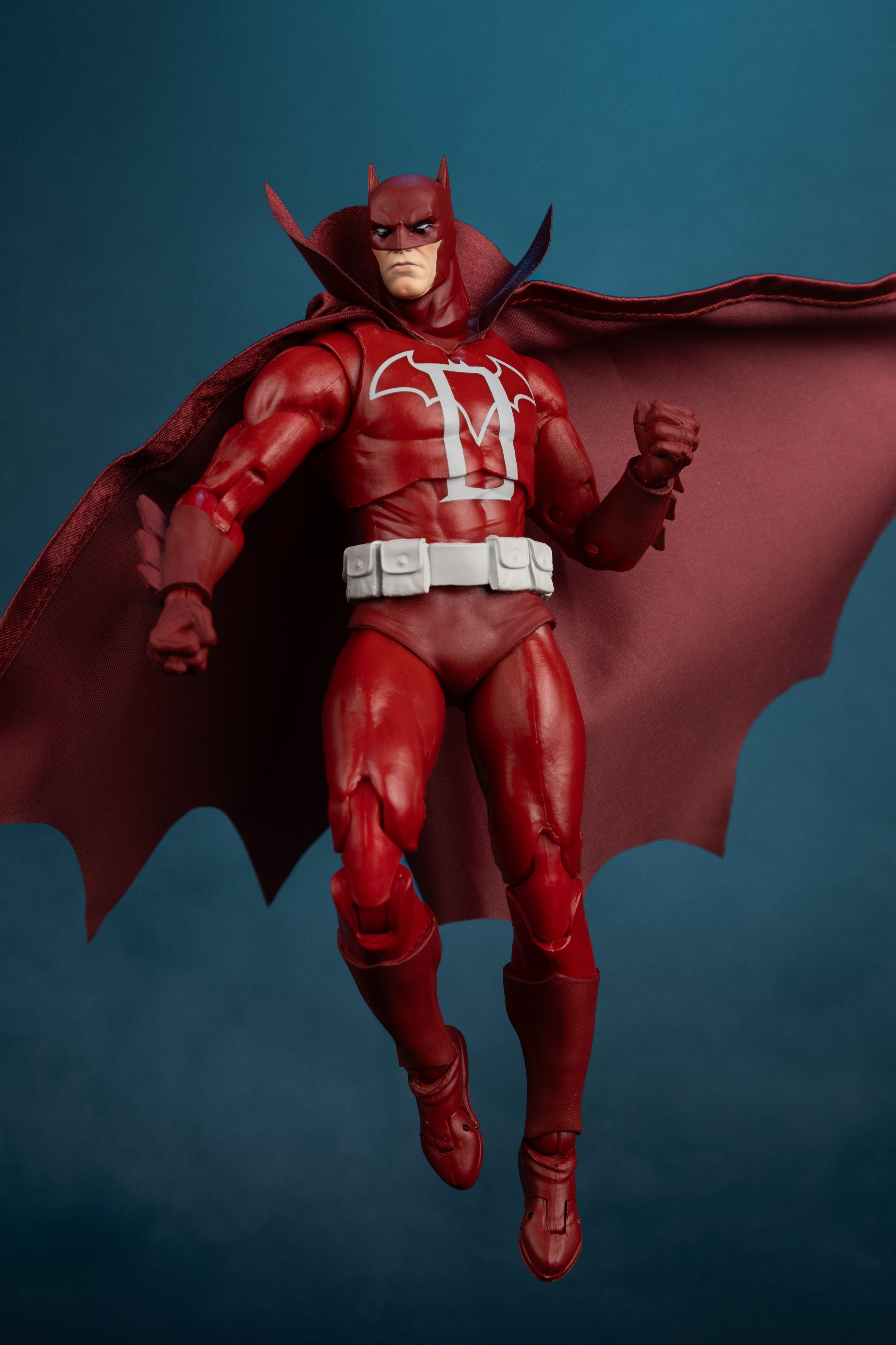 Batman Knight Terrors DC Multiverse 7-Inch Figure — Side View Airborne Pose Showing Cape Drape