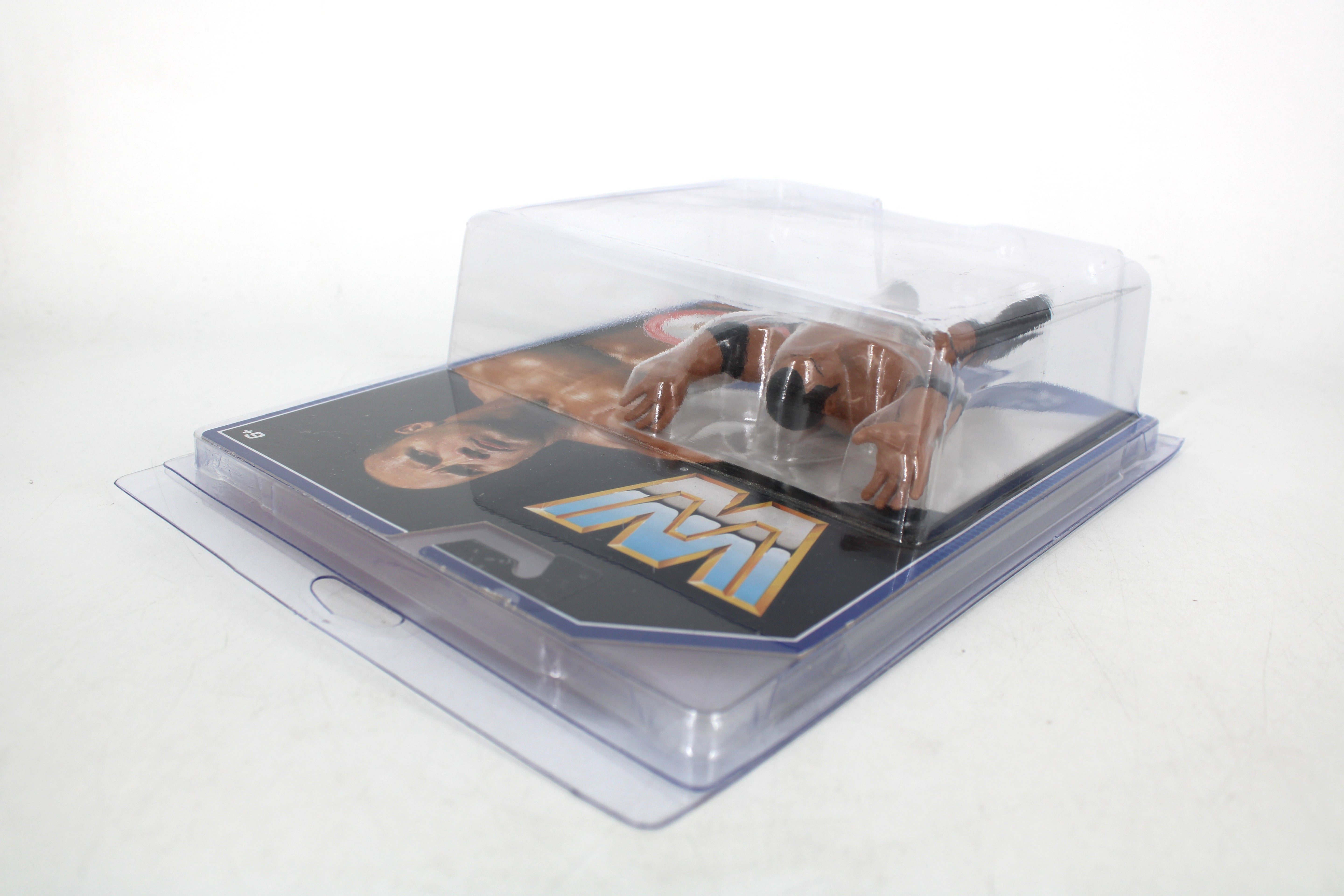 The Rock WWE Retro Series Action Figure — Opposite Side Angle Showing Figure in Bubble with WWE Logo Card Art Detail