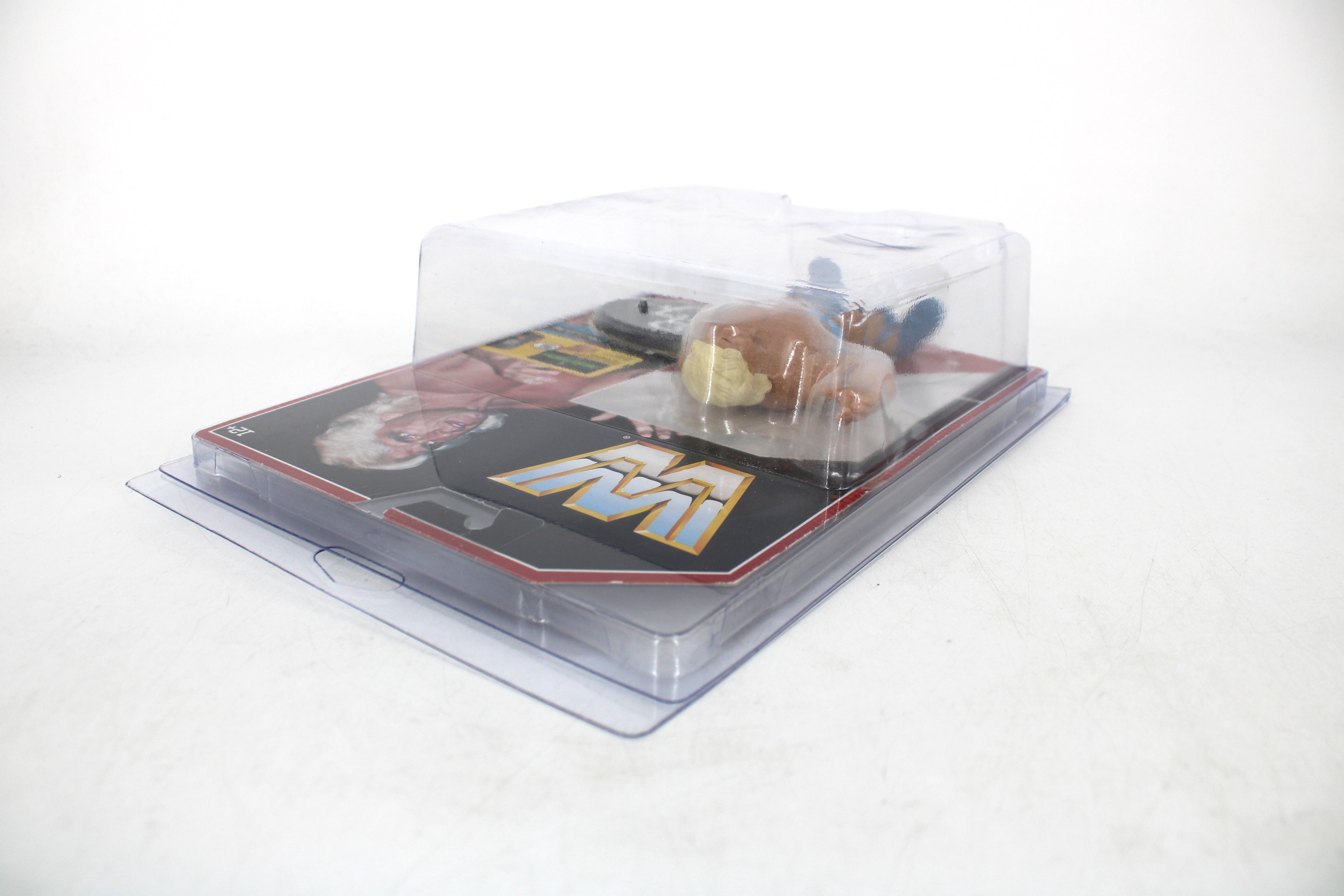 Ric Flair WWE Retro Series 4 Action Figure — Back View of Sealed Package Showing WWE Logo Card Art