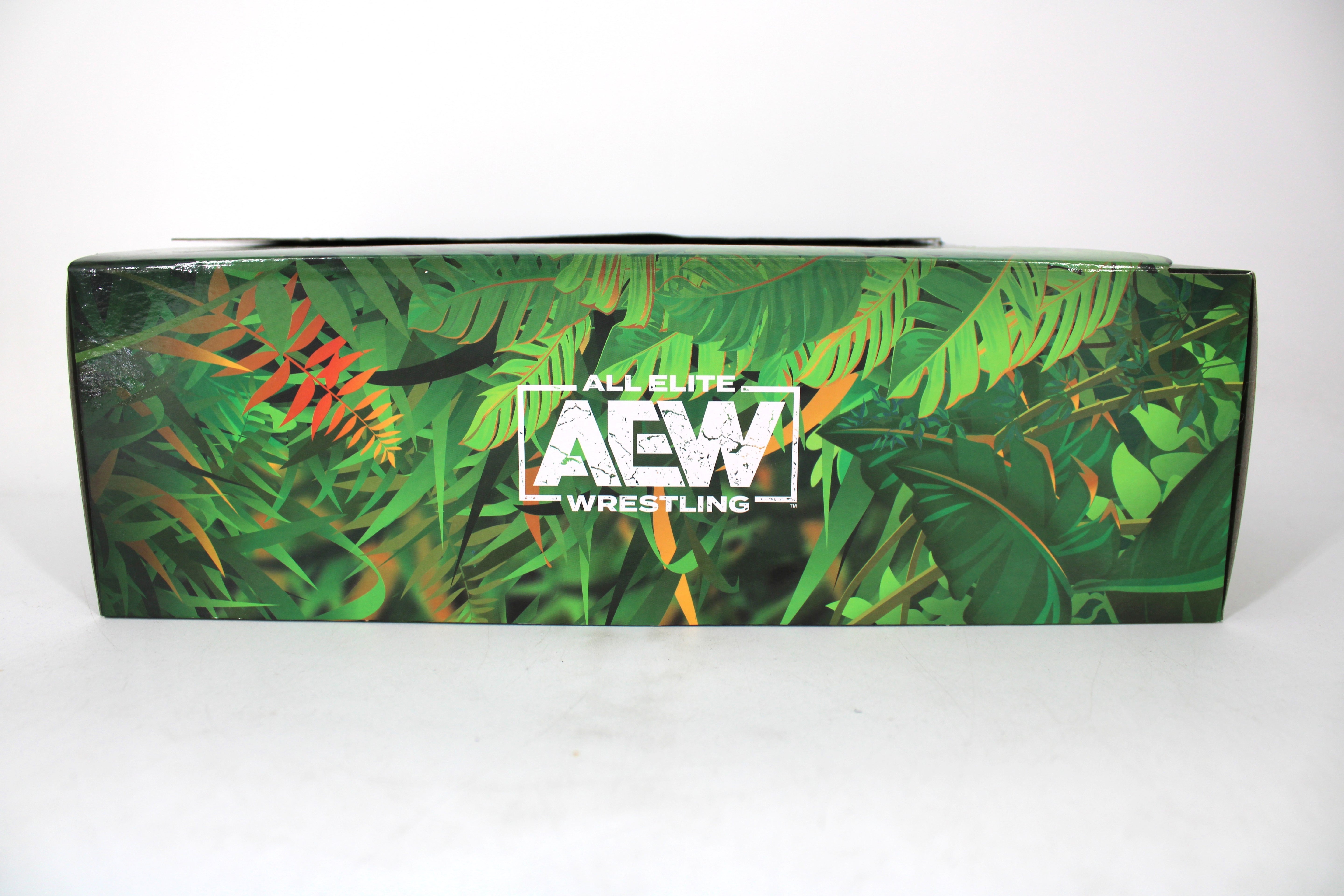 Jungle Boy & Luchasaurus Jurassic Express AEW Unrivaled Collection 2-Pack — Box Art Close-Up Showing Jungle-Themed AEW Logo on Bottom Panel