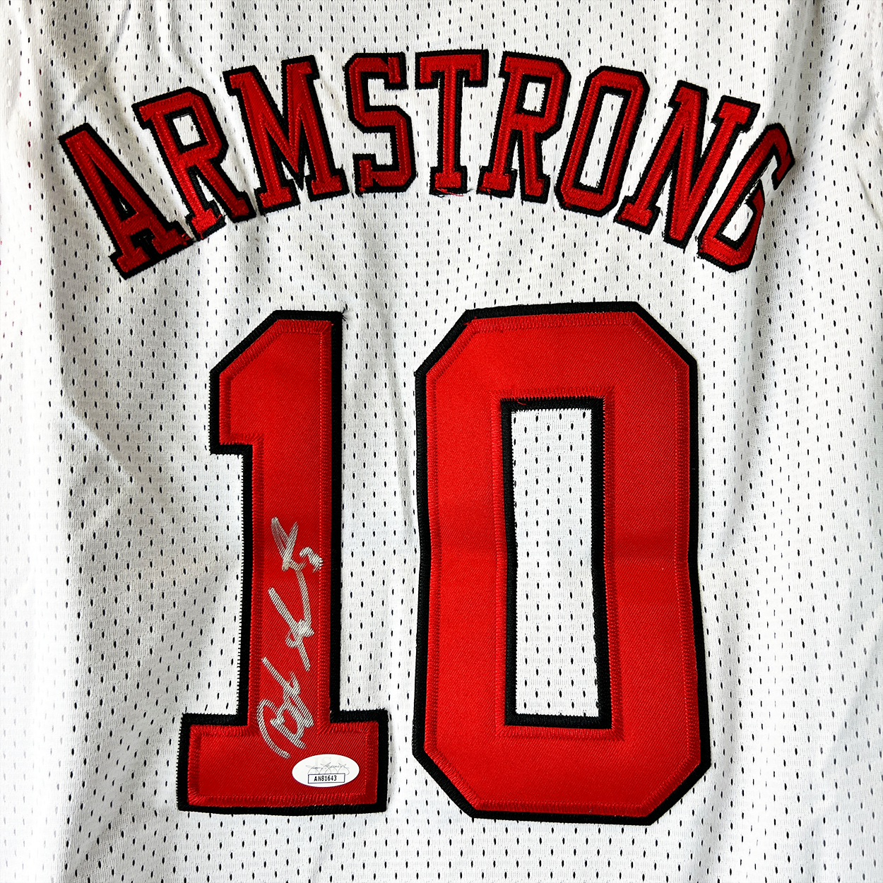 B.J. Armstrong Autographed White Chicago Bulls Jersey (JSA Certified Authentic)