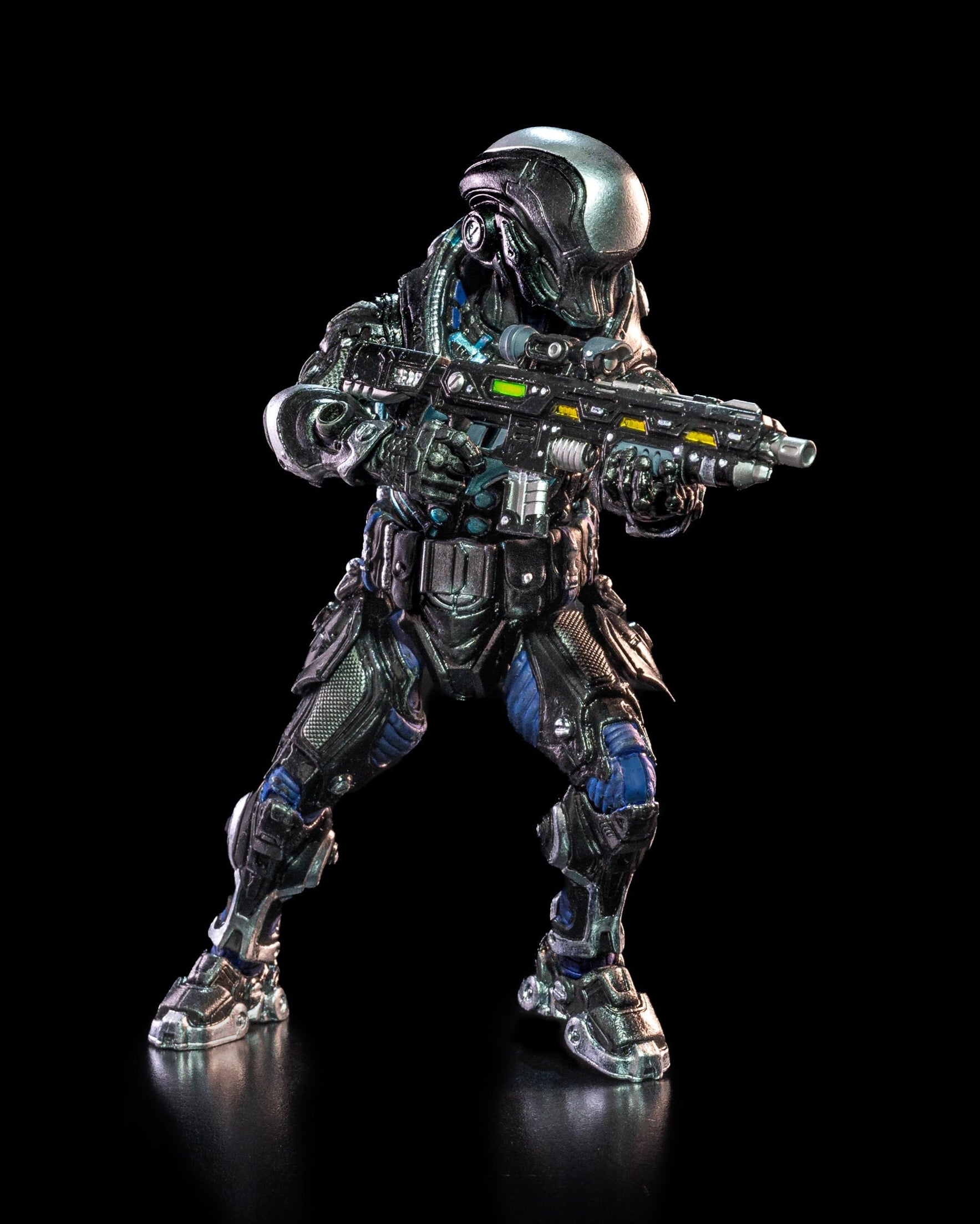 Science fiction action figure holding a weapon on a black background