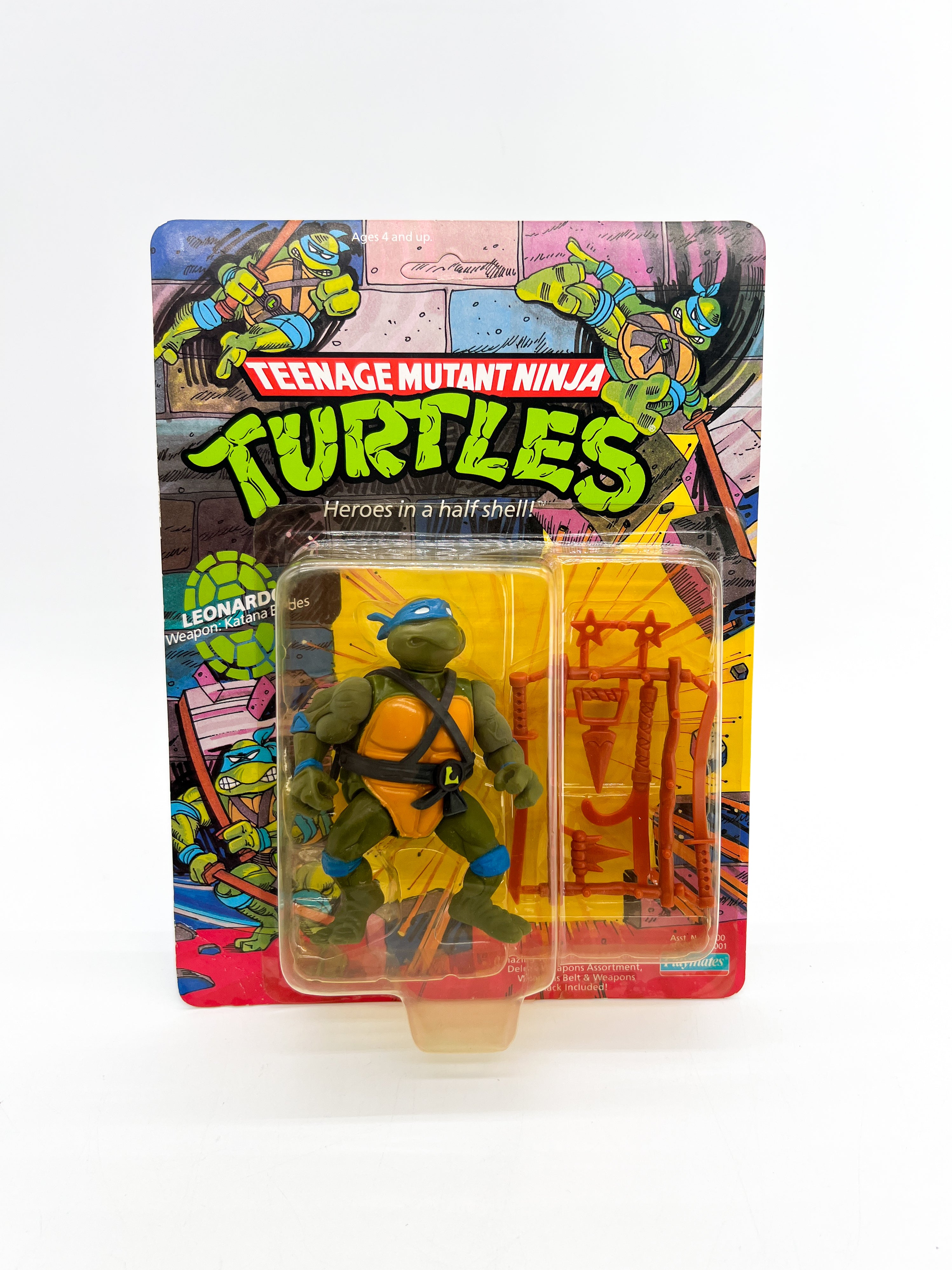Vintage Teenage Mutant Ninja Turtles action figure in packaging on a white background