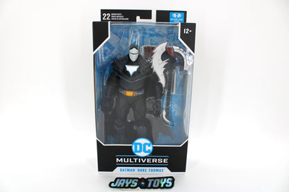 Batman Duke Thomas DC Multiverse Figure — Box Front View with Battle-Axe Accessory Visible