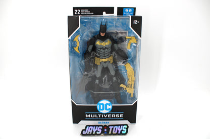 Batman Prestige Suit DC Multiverse 7-Inch Figure — Box Front View with Gold Accessories Displayed