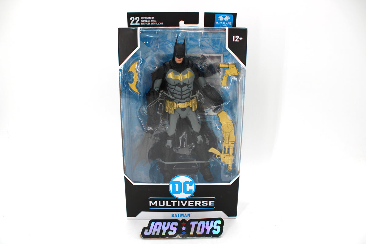 Batman Prestige Suit DC Multiverse 7-Inch Figure — Box Front View with Gold Accessories Displayed