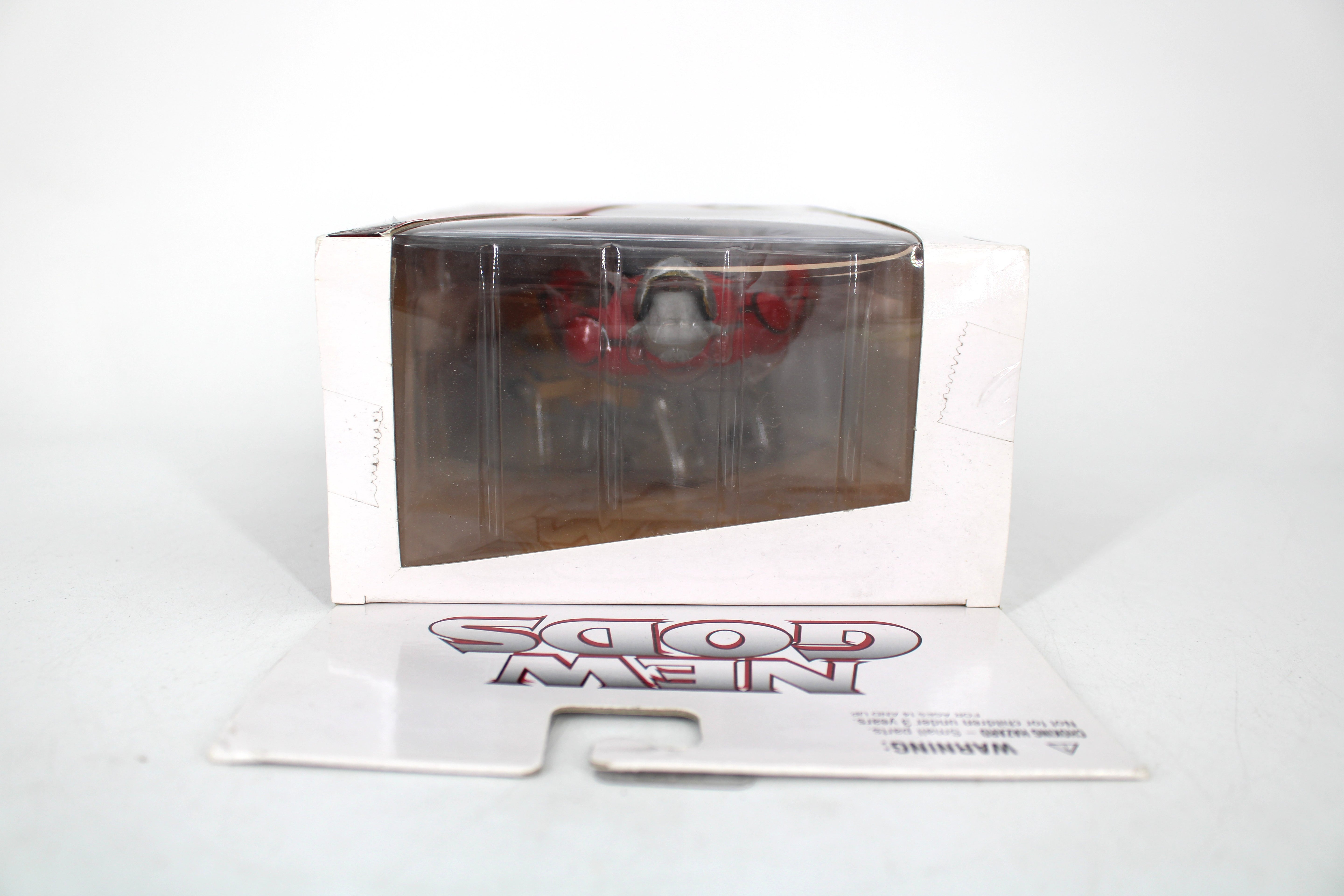 Orion New Gods DC New 52 Figure — Top View with Bent Hanger Card Detail