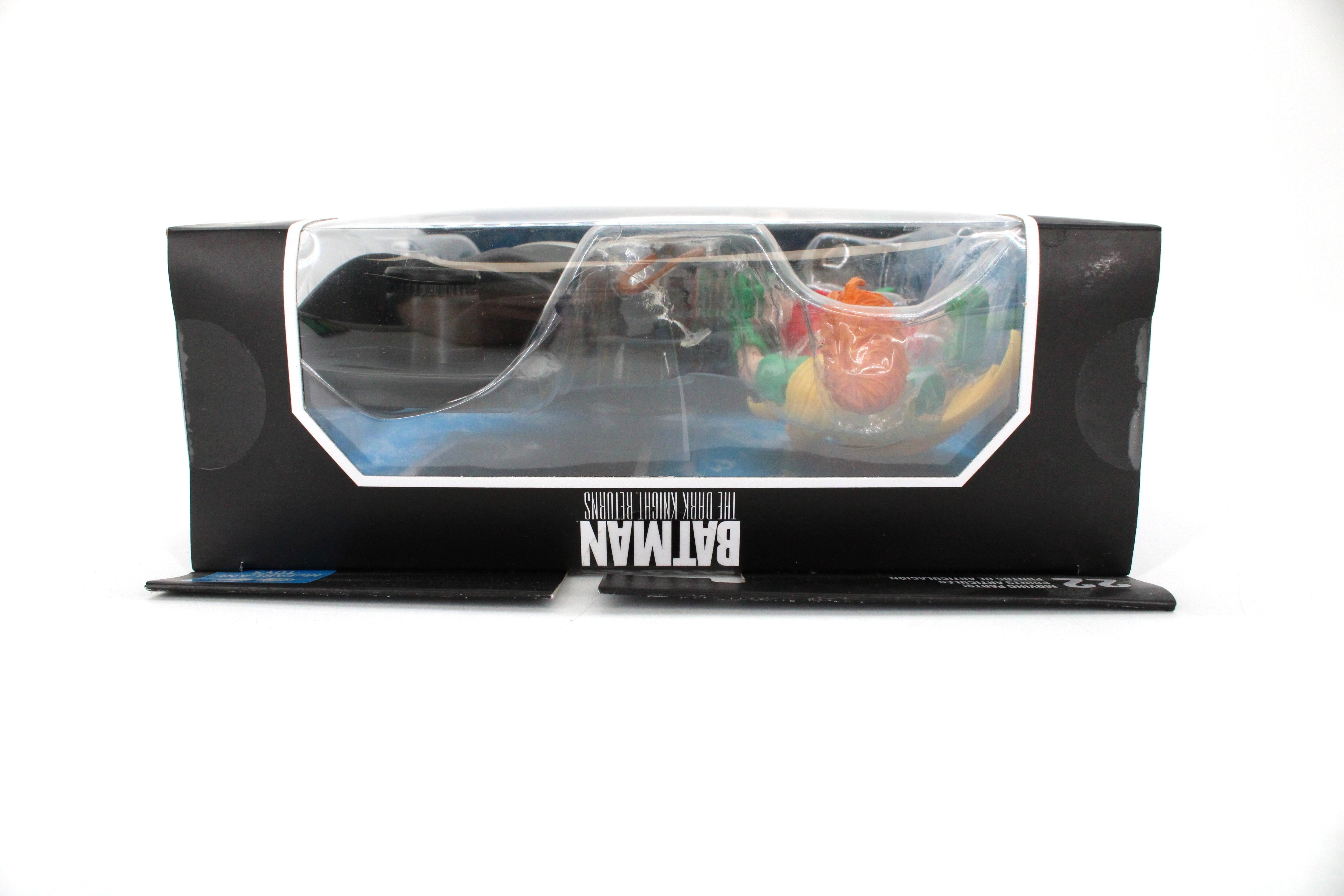 Robin DC Multiverse Dark Knight Returns 7-Inch Figure — Bottom View Showing Clamshell Crack Detail