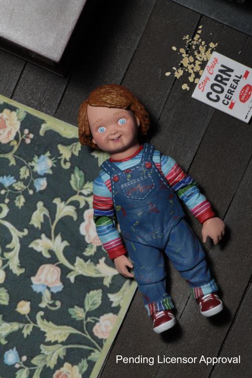 Chucky Child's Play Ultimate 4-Inch Figure — Figure Posed Lying Down Side View