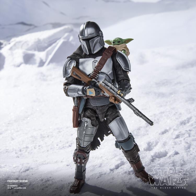 Mandalorian with Grogu Black Series 6-Inch Deluxe — Front View with Blaster Rifle in Snowy Scene