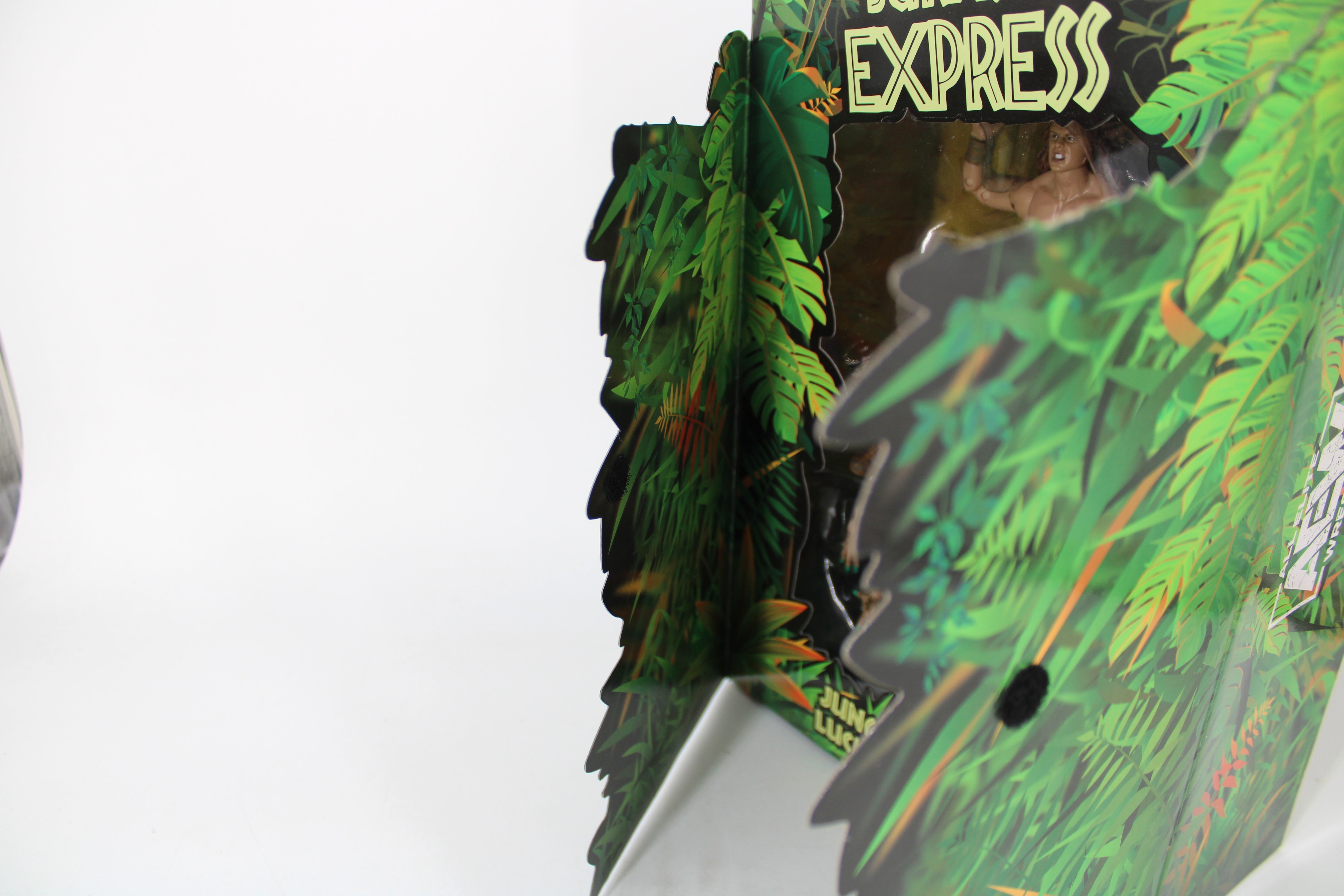 Jurassic Express AEW Unrivaled 2-Pack 2021 — Die-Cut Holographic Side Panel Detail at Angle