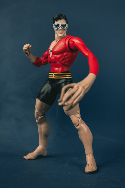 Plastic Man DC Multiverse 7-Inch Figure — Articulation Pose with Extended Leg and Elongated Arm
