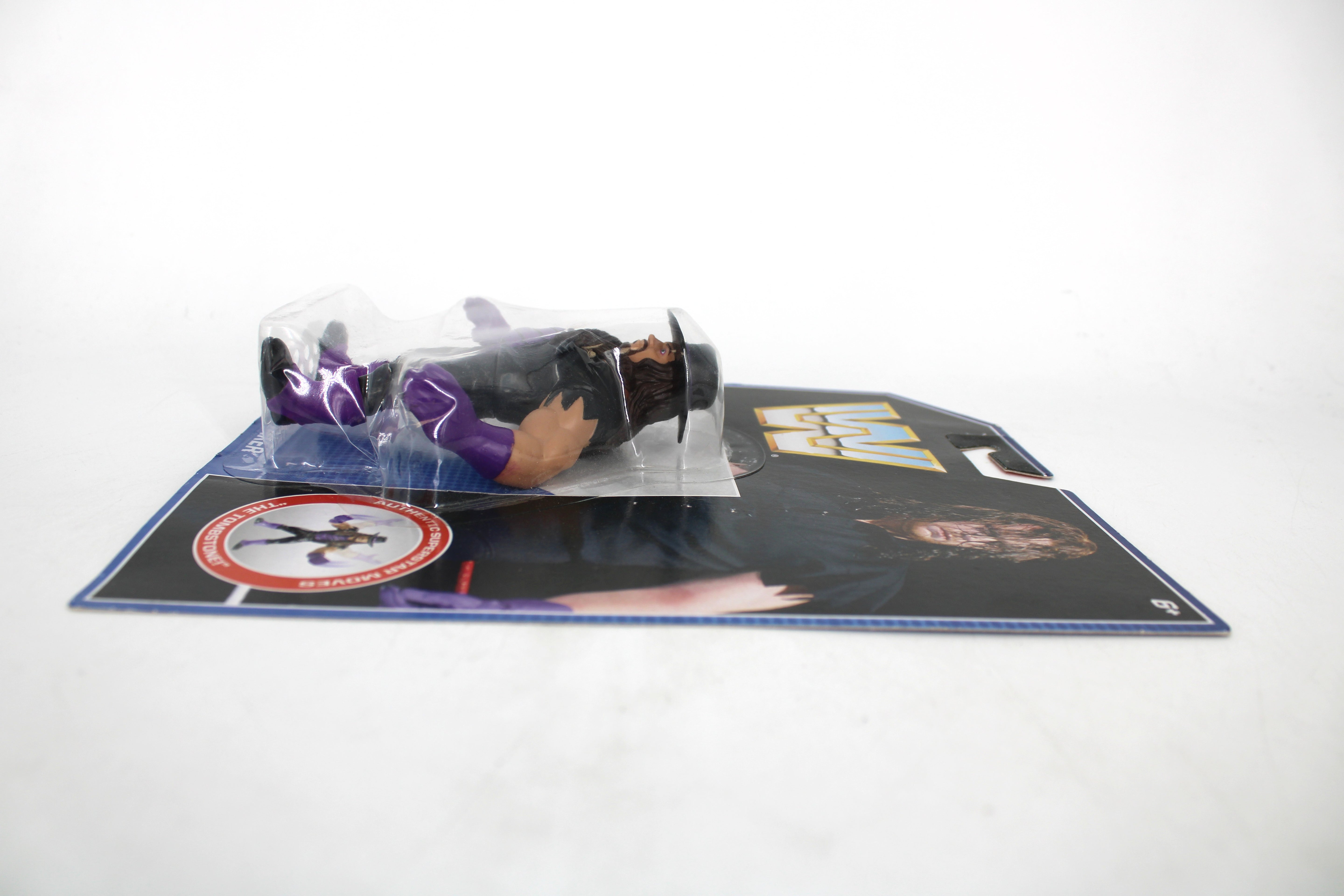 Undertaker WWE Retro Series 2016 Figure — Side View Right with Tombstone Medallion Detail