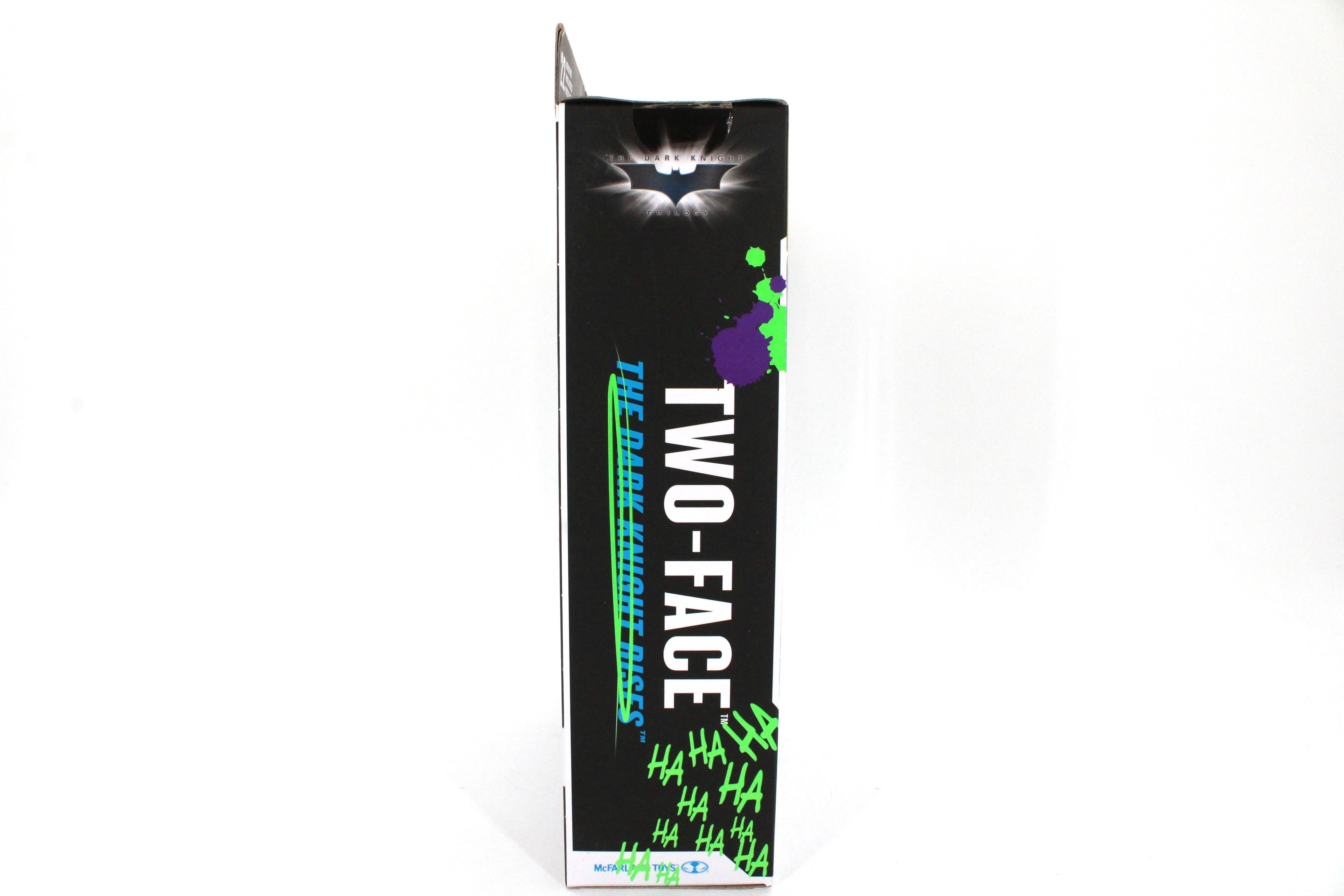 Two-Face DC Multiverse Gold Label Artist Series — Side Panel with Dark Knight Trilogy Logo and HA HA HA Graffiti