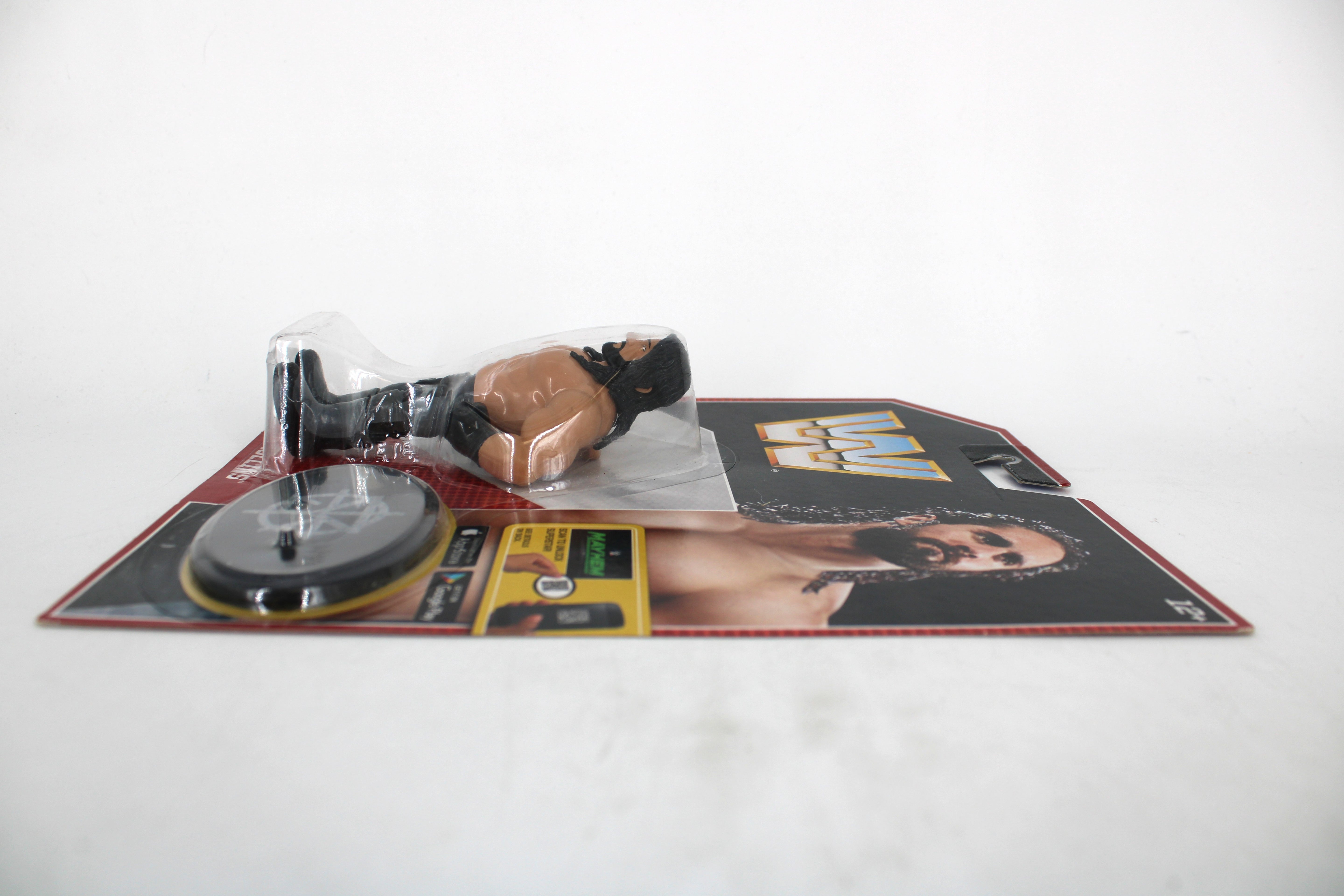 Seth Rollins WWE Retro Series 3 Action Figure — Side View with Figure, Stand, and Card Laid Flat