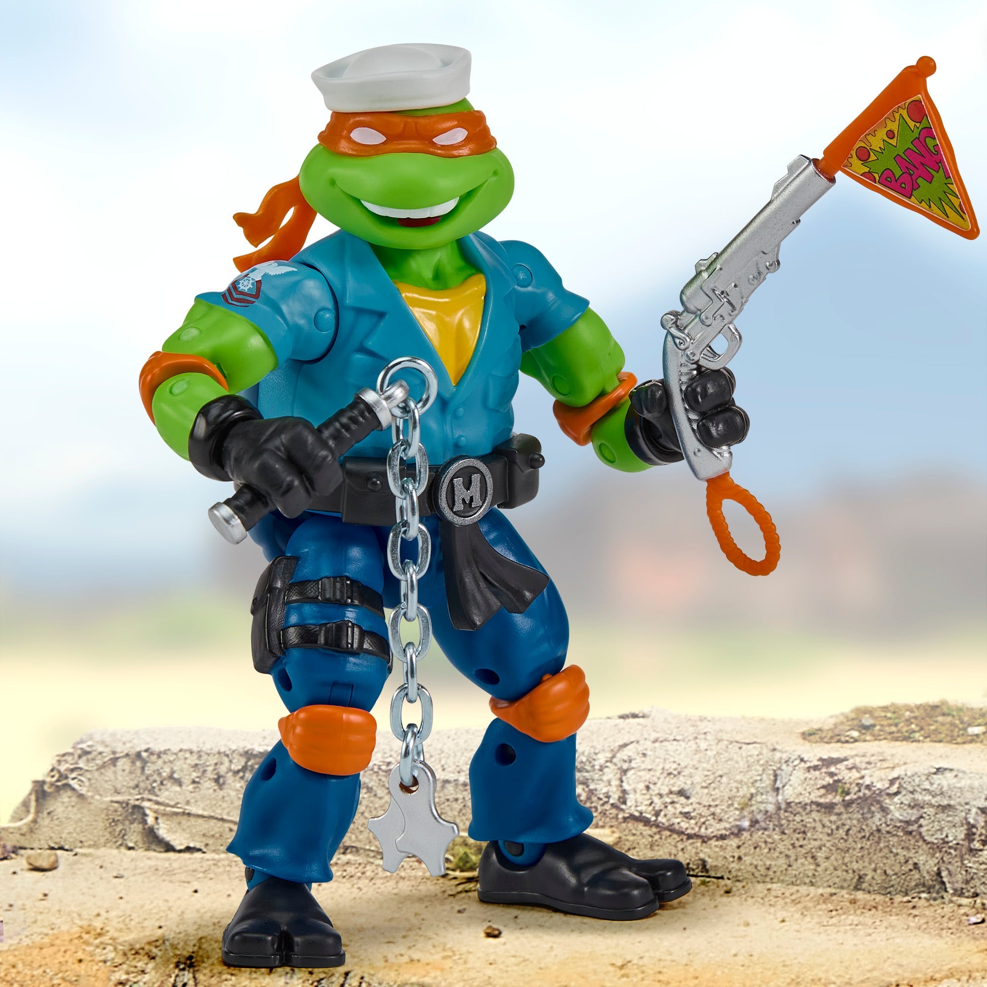 Michelangelo as Shipwreck TMNT x GI Joe 4.5-Inch Figure — Articulation Pose Holding Nunchaku and Pizza Prank Pistol