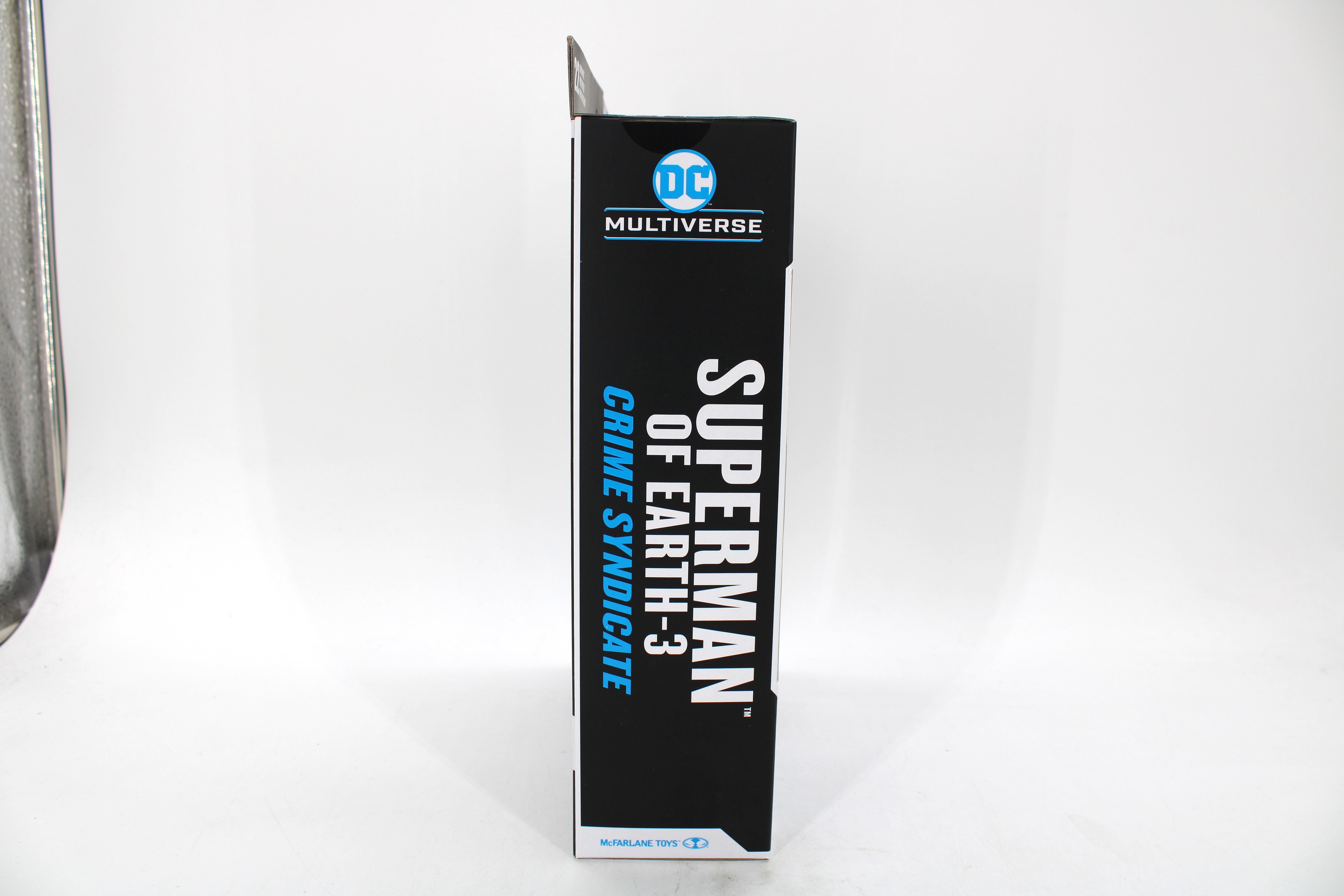 Superman of Earth-3 DC Multiverse Crime Syndicate 7-Inch Figure — Left Side View with DC Multiverse Branding