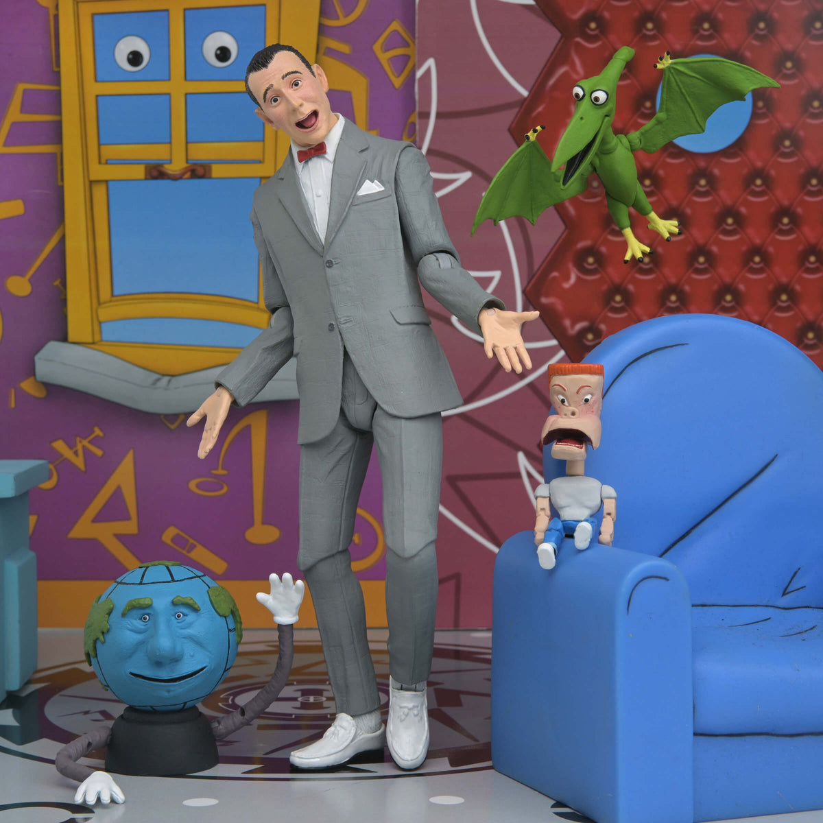 Pee-Wee Herman NECA Ultimate 7-Inch Figure Set — Articulation Pose with Pals and Blue Armchair Background