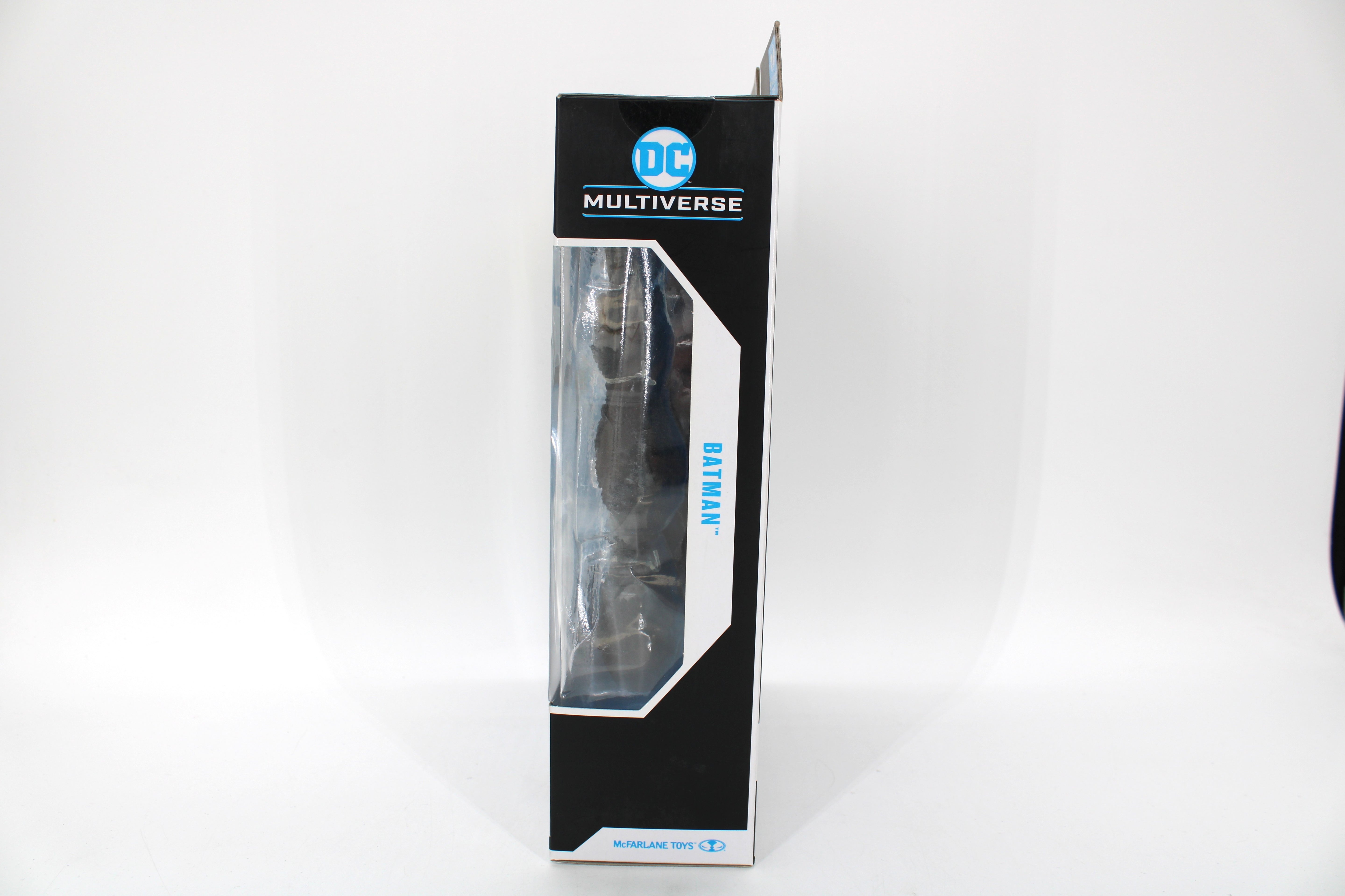 Batman Arkham City DC Multiverse Gold Label Black & White Figure — Opposite Side View with Figure Visible Through Window