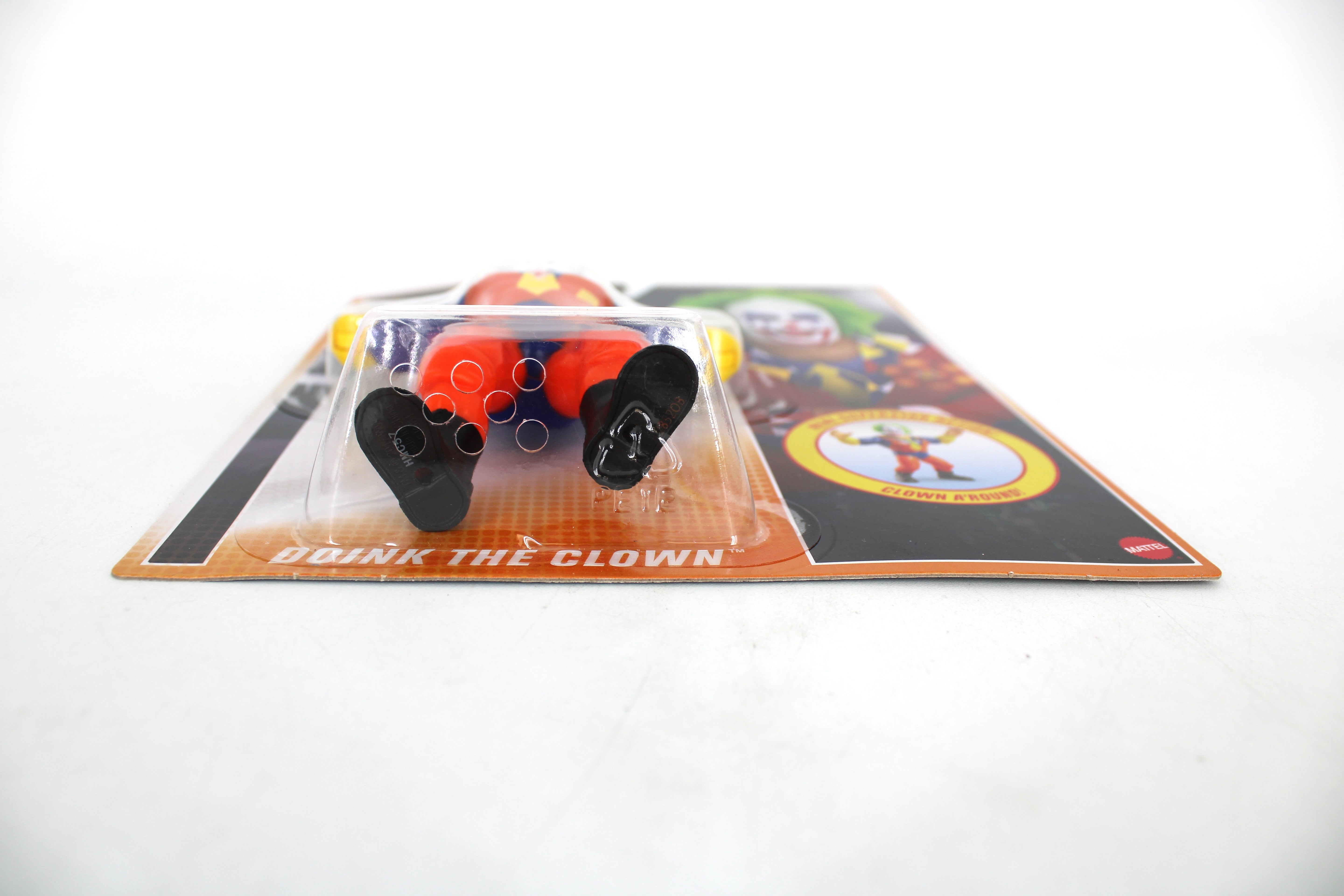 Doink the Clown WWE Retro Series Action Figure — Low-Angle View Showing Figure Feet and Card Name Plate