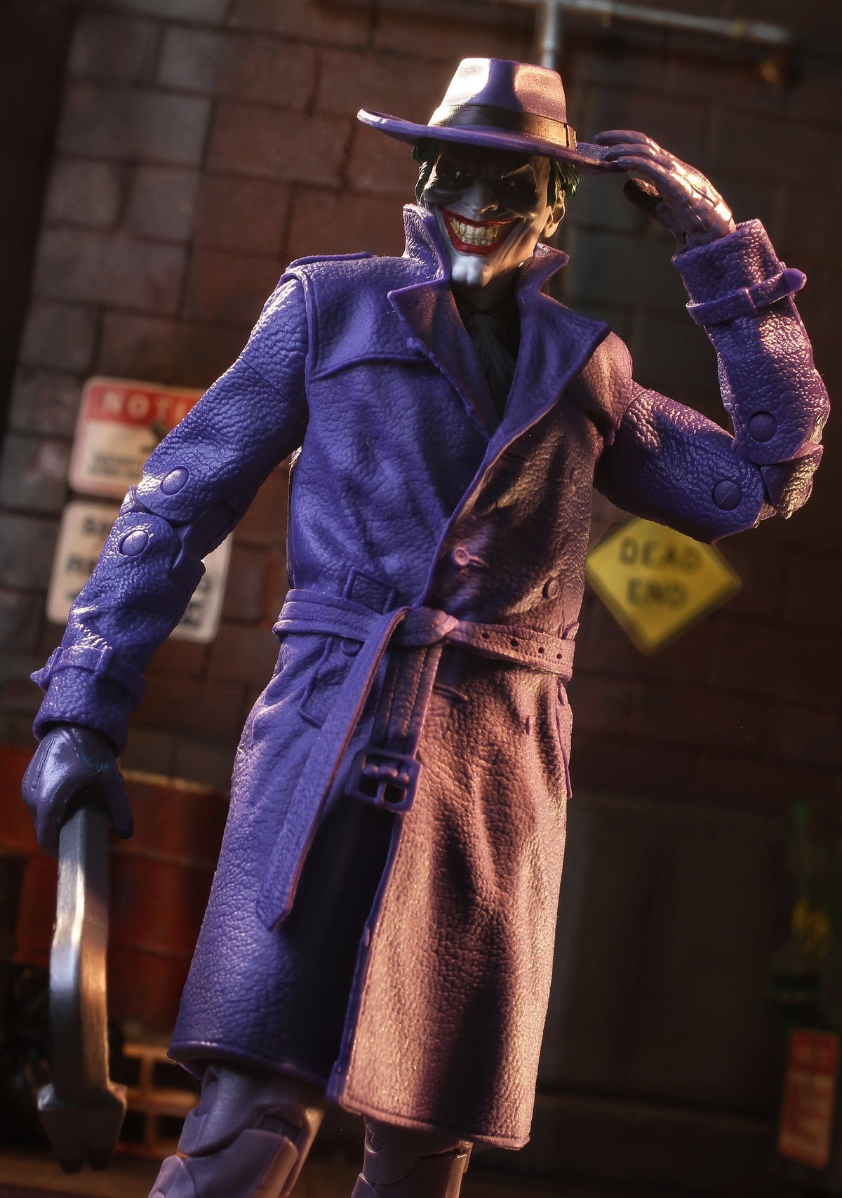 Joker The Comedian DC Multiverse 7-Inch Figure — Figure Detail Close-Up Tipping Hat in Alley