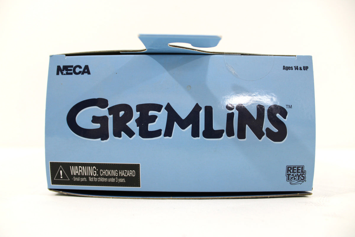 Gremlin Gremlins Ultimate Figures Action Figure — Box Art Close-Up Showing NECA Reel Toys Branding and Warning Label