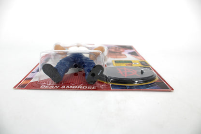 Dean Ambrose WWE Retro Series 3 Action Figure — Bottom-Angle Detail Showing Figure Feet, Base with Ambrose Logo, and Card Nameplate