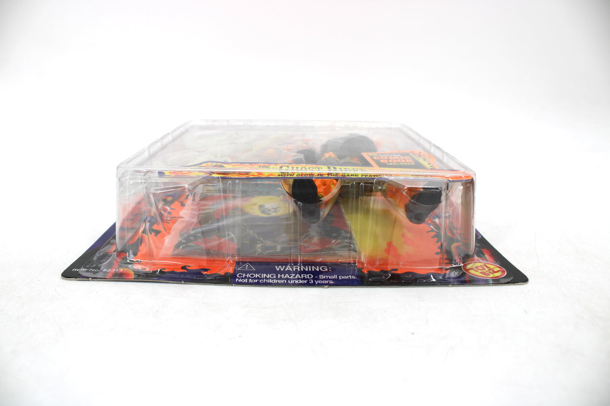 The Original Ghost Rider (Johnny Blaze) Marvel Comics Ghost Rider 5-Inch Action Figure — Side View with Package Detail and Choking Hazard Warning Visible