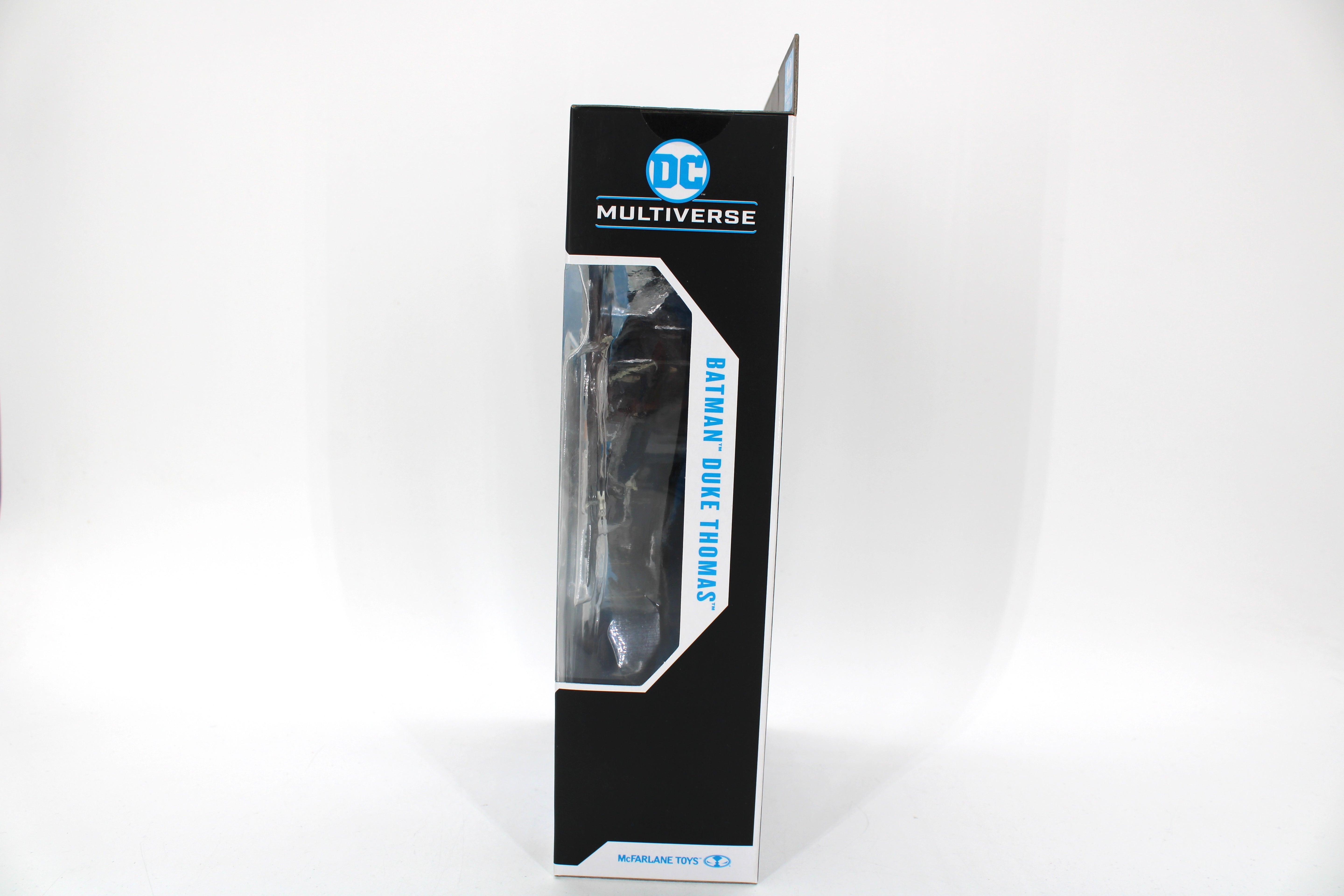Batman Duke Thomas DC Multiverse Figure — Side View Showing Figure Through Window Panel
