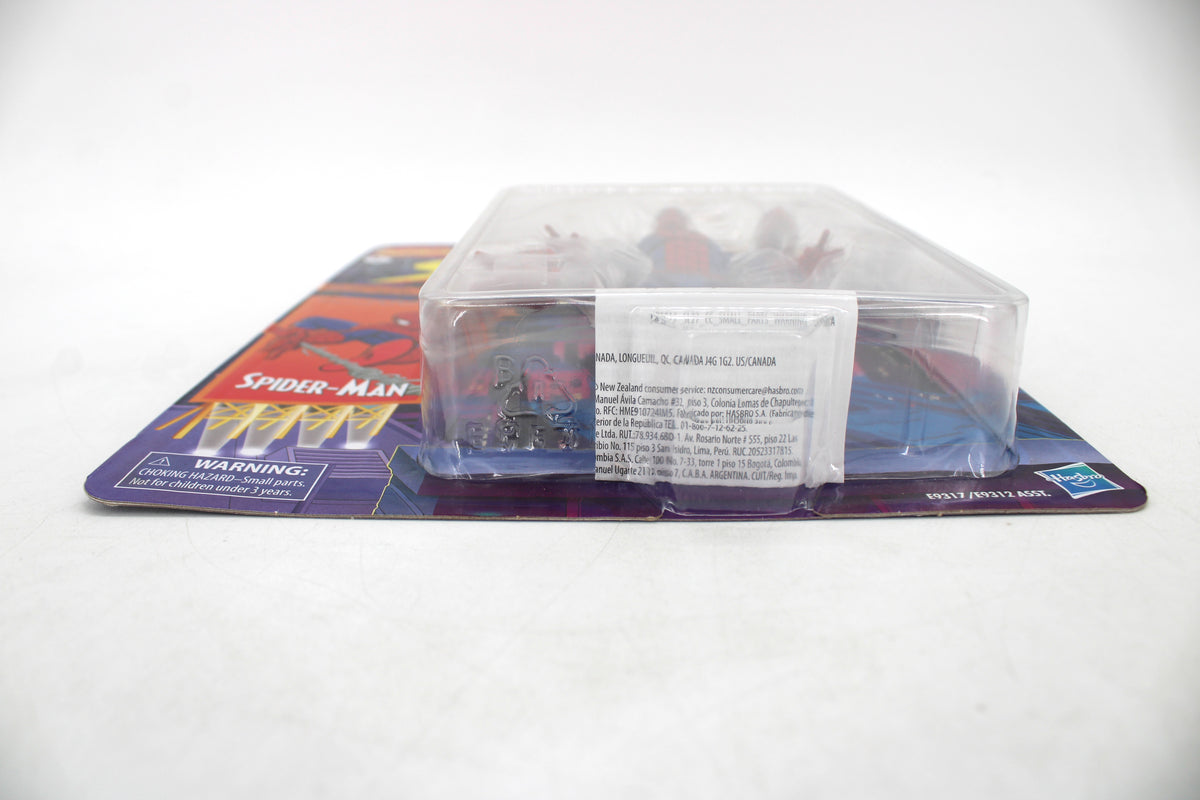 Spider-Man Marvel Legends Retro Collection 6-Inch Figure — Side View with Package Detail and Warning Label Visible