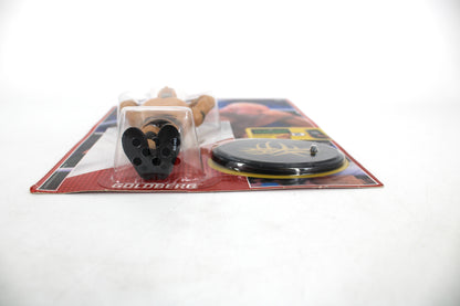 Goldberg WWE Retro Series Action Figure — Package Detail Showing Name Card, Figure Bubble, and Display Stand Close-Up