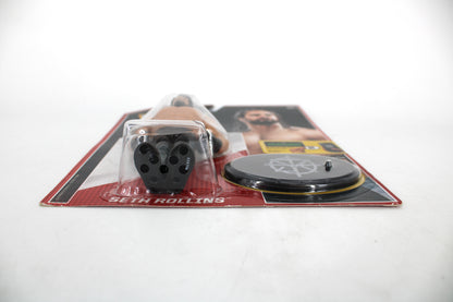 Seth Rollins WWE Retro Series 3 Action Figure — Package Detail Showing Name Card, Figure, and Seth Rollins Logo Stand