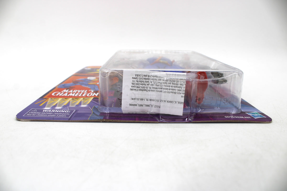 Marvel's Chameleon Marvel Legends Retro Collection 6-Inch Figure — Side View with Package Detail and Warning Label Visible