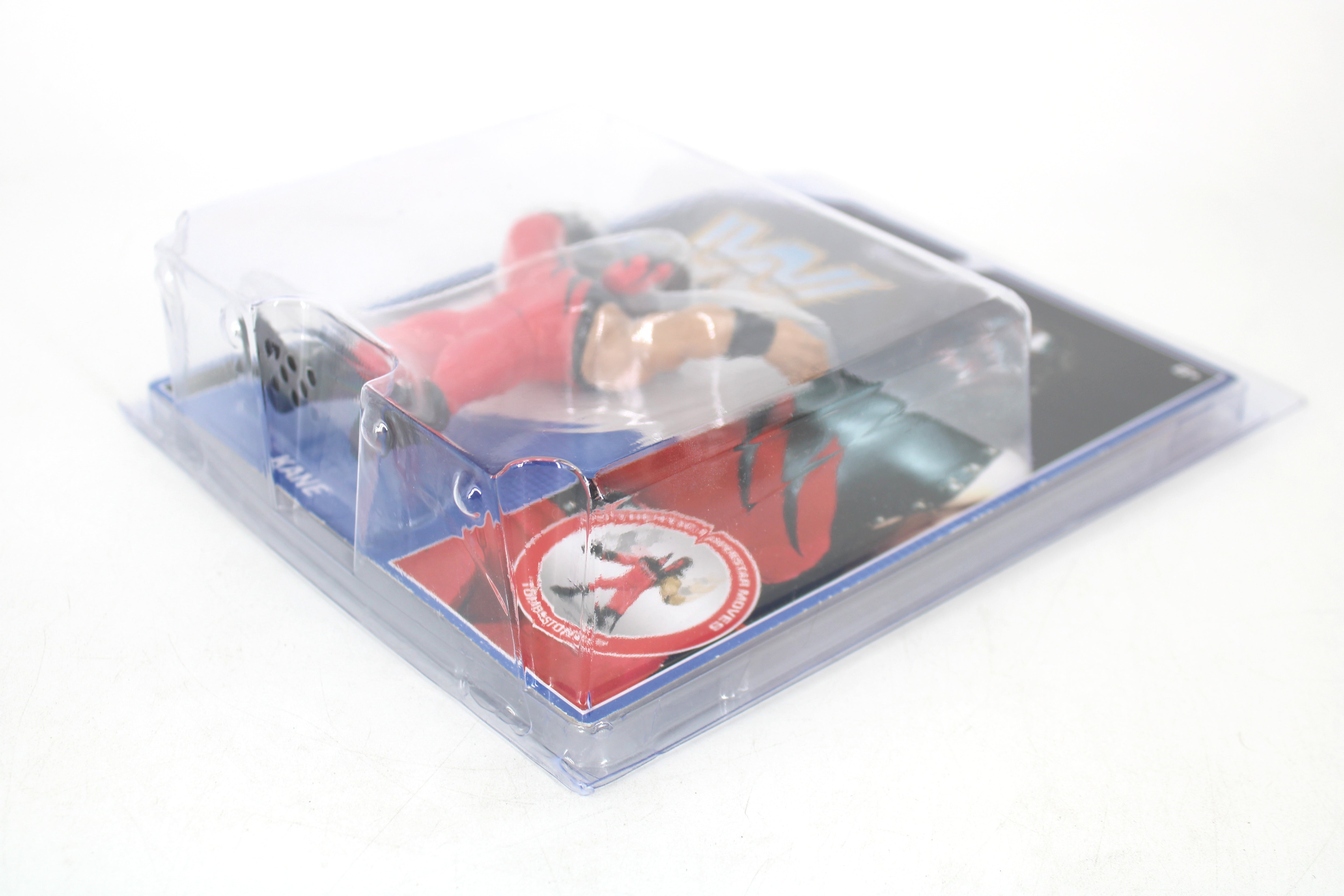 Kane WWE Retro App Series Action Figure — Side View with Bubble Detail and Tombstoner Superstar Moves Medallion Visible