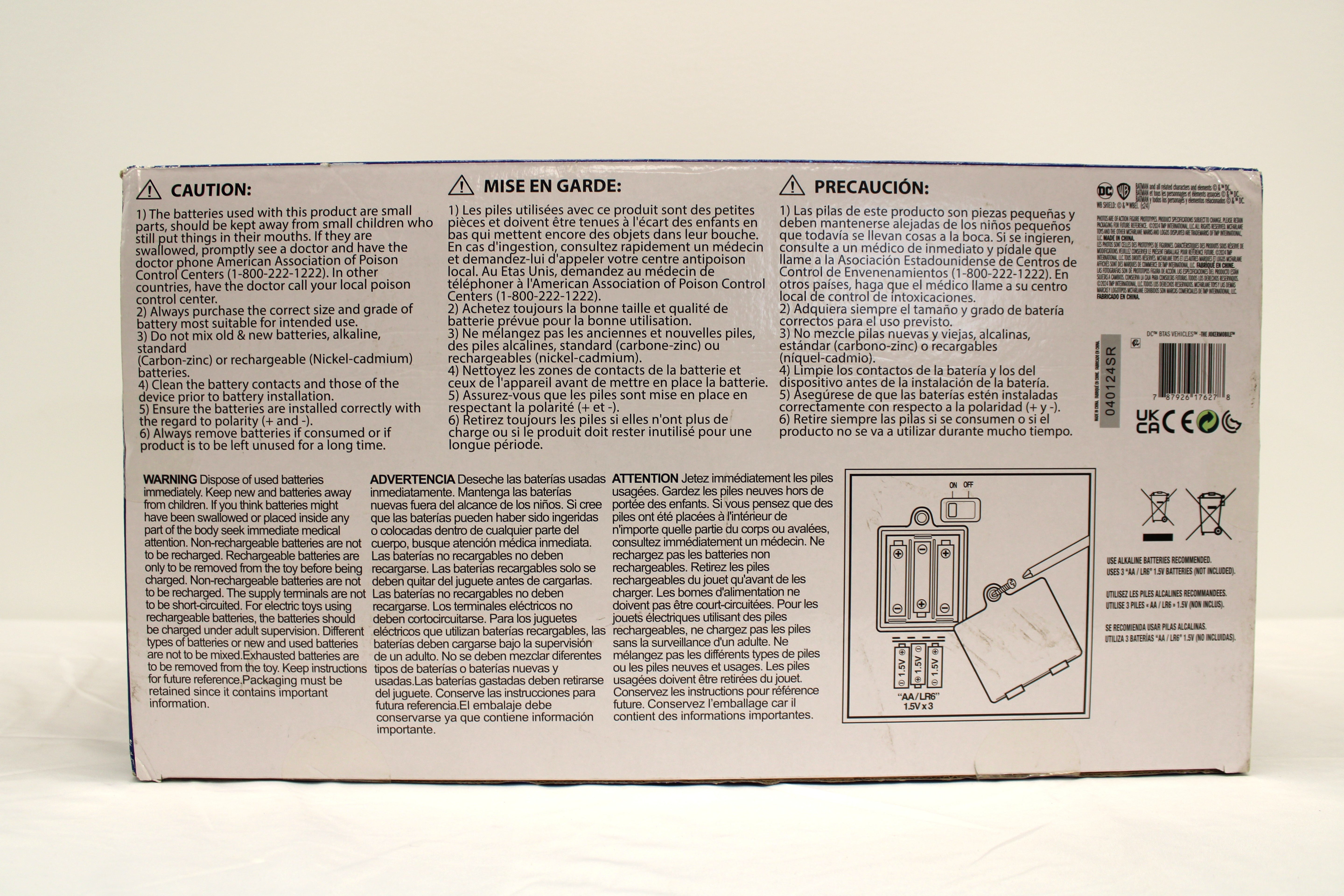 The Jokermobile DC Direct Batman: The Animated Series Gold Label — Package Detail with Multilingual Safety and Battery Information
