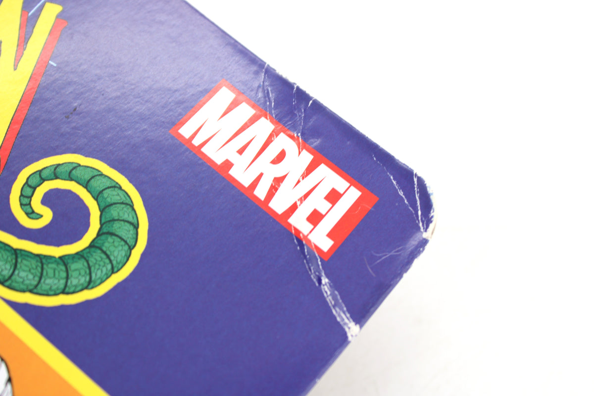 Marvel's Lizard Marvel Legends Spider-Man Retro Collection — Package Detail Close-Up Showing Marvel Logo and Corner Wear