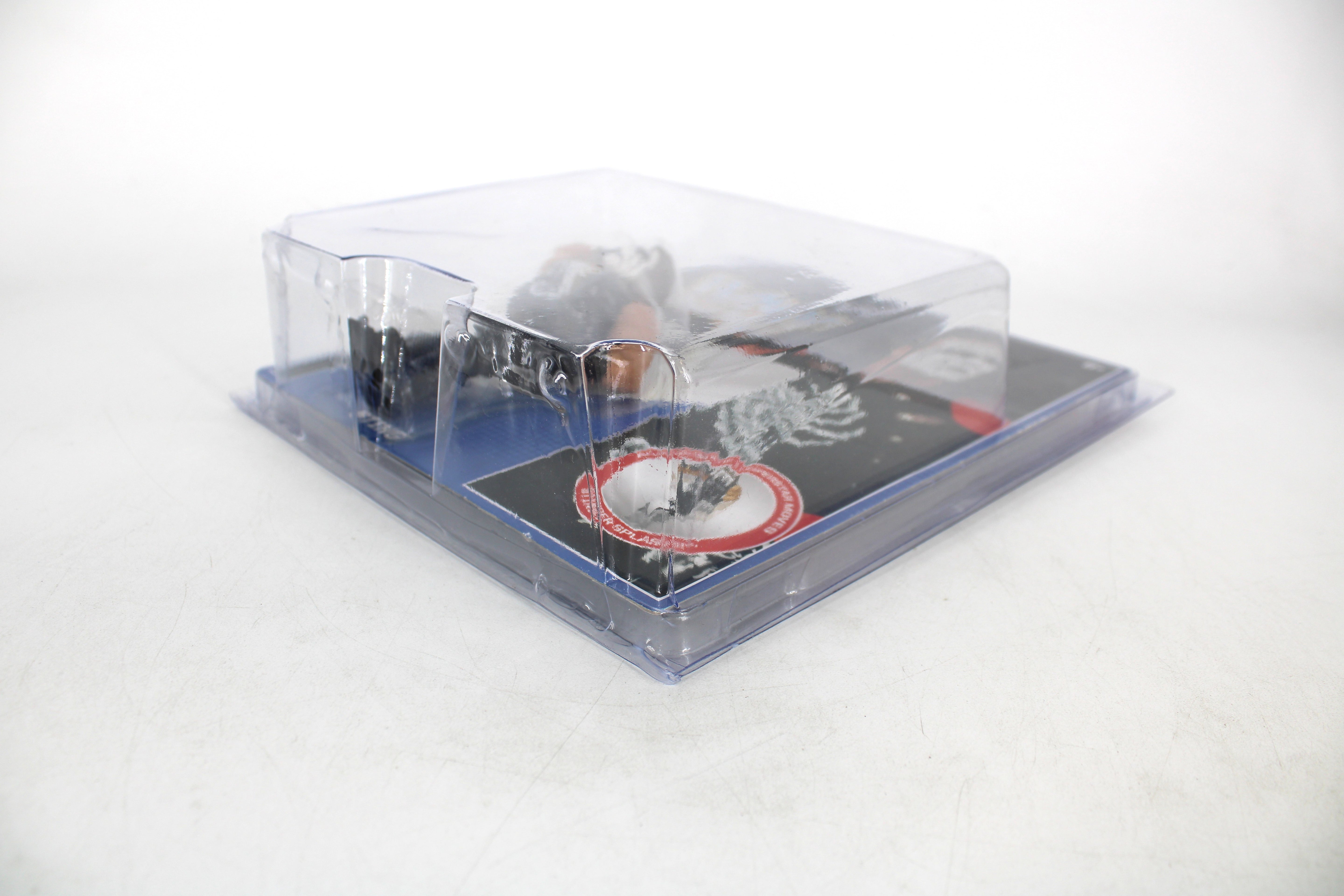 Sting WWE Retro Action Figure — Angled Side View Inside Clear Protective Case with Bubble Detail