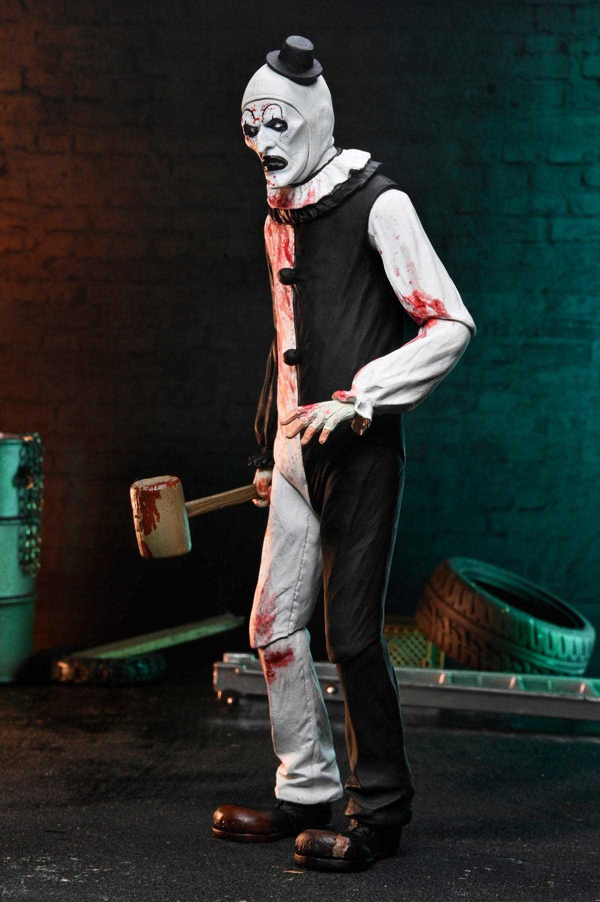 Art the Clown Terrifier 2 Ultimate 7-Inch Figure — Side View Hunched with Mallet