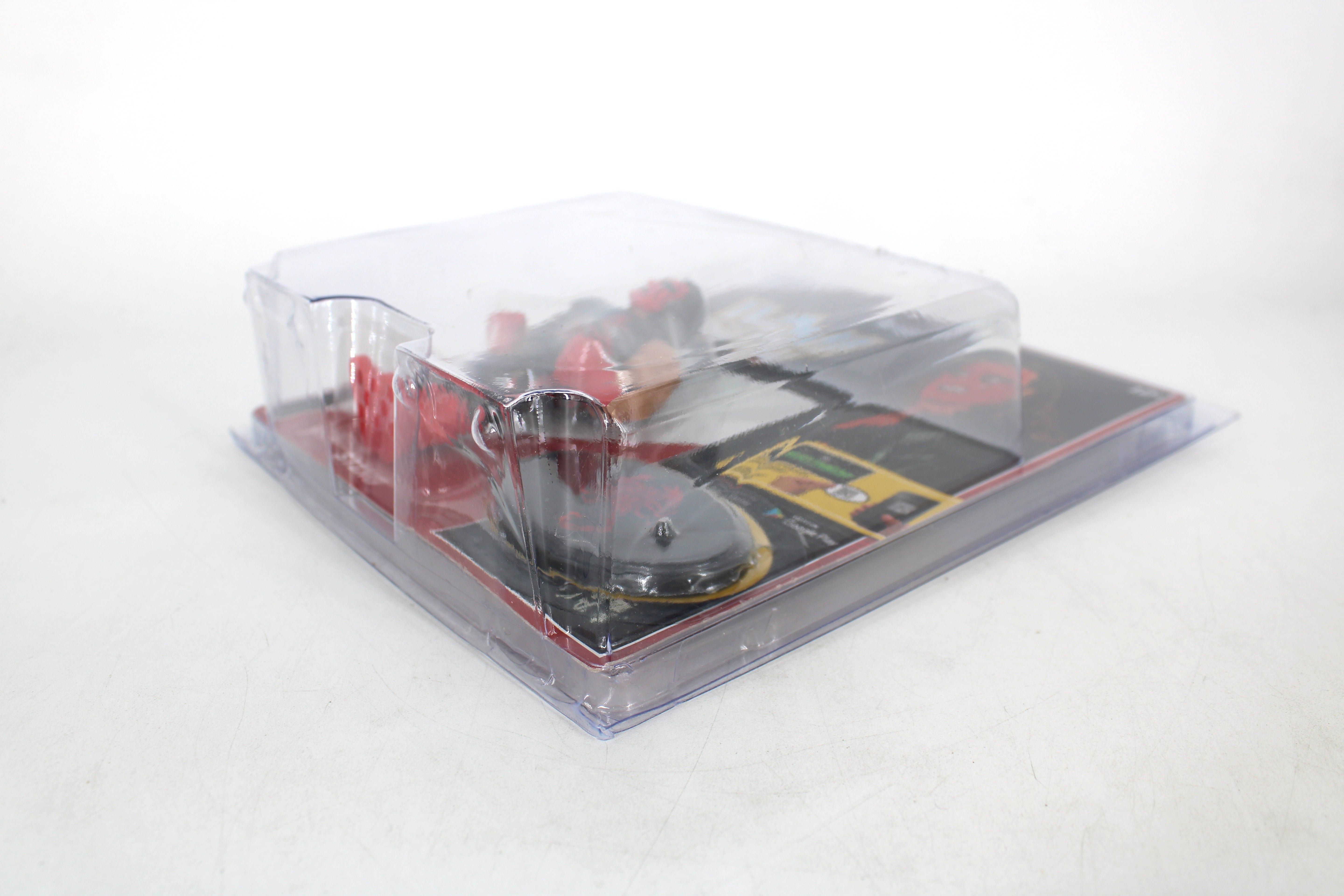 Sting WWE Retro Series Action Figure — Angled View with Clear Protective Clamshell Case Over Package