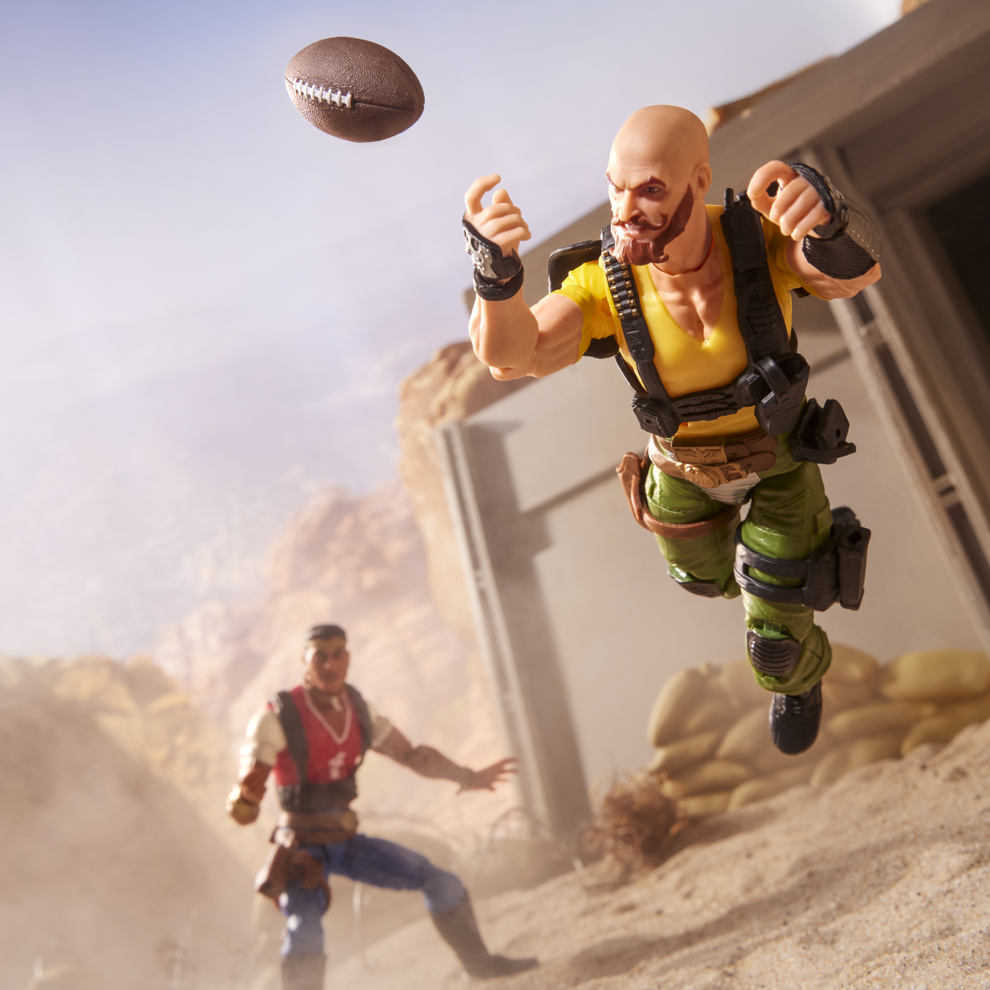 Taurus G.I. Joe Classified Series 6-Inch — Articulation Pose Leaping with Football Accessory and Red Dog Figure in Background