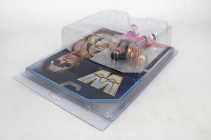 Bret "Hit Man" Hart WWE Retros Action Figure — Back View Showing Mattel Logo and Card Art in Protective Case
