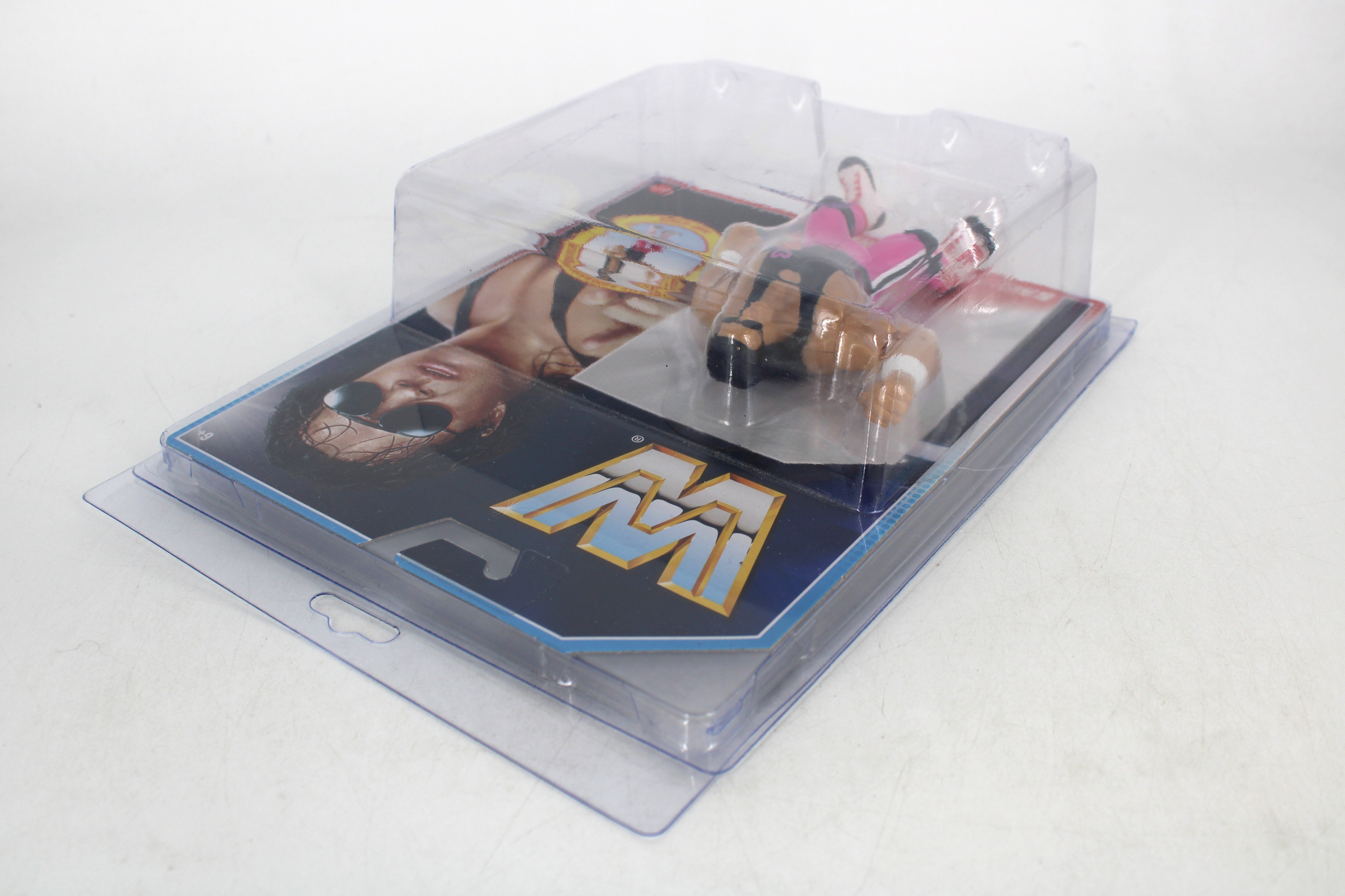 Bret "Hit Man" Hart WWE Retros Action Figure — Back View Showing Mattel Logo and Card Art in Protective Case
