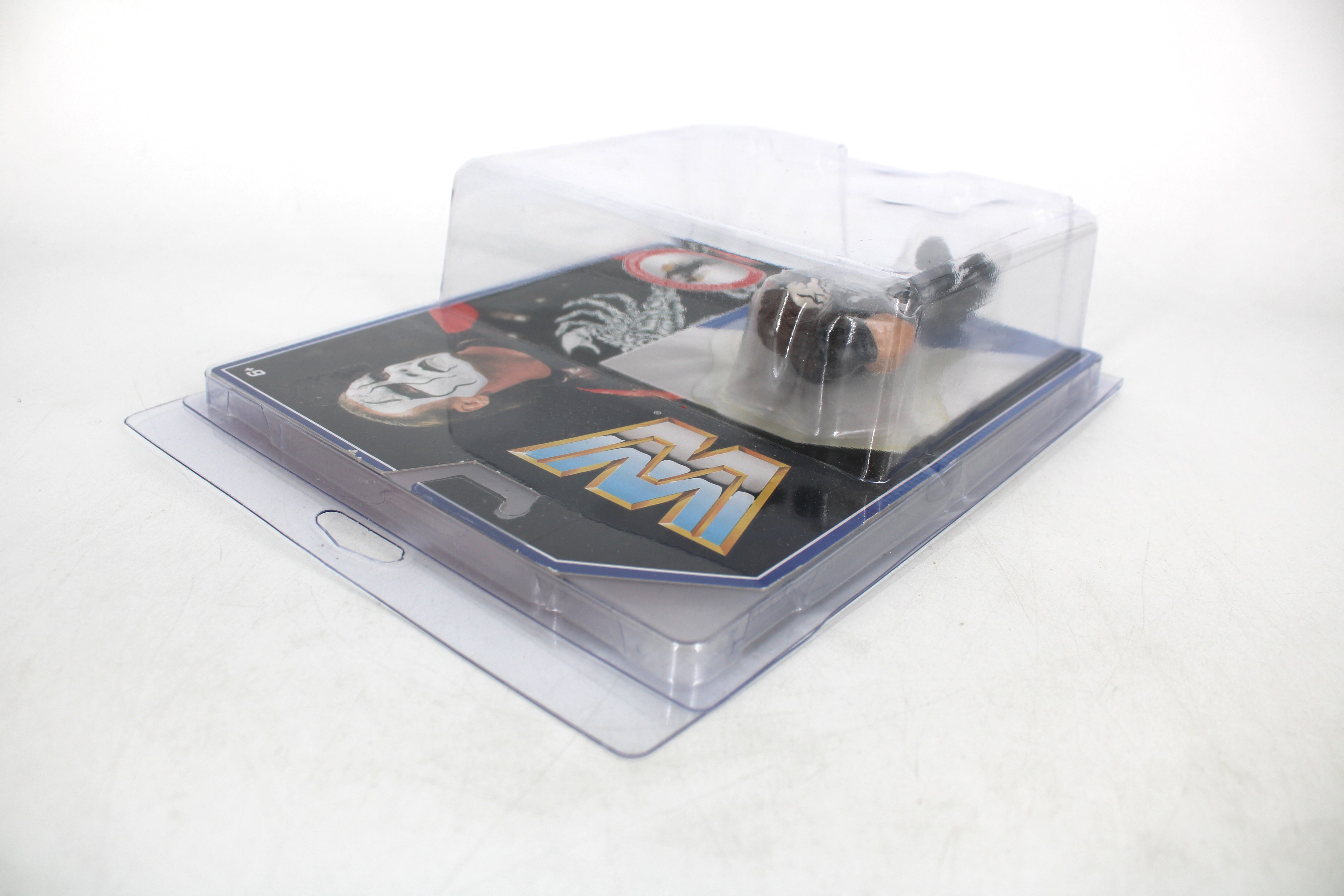 Sting WWE Retro Action Figure — Card Front View Inside Clear Protective Case Showing WWE Logo and Sting Face Art