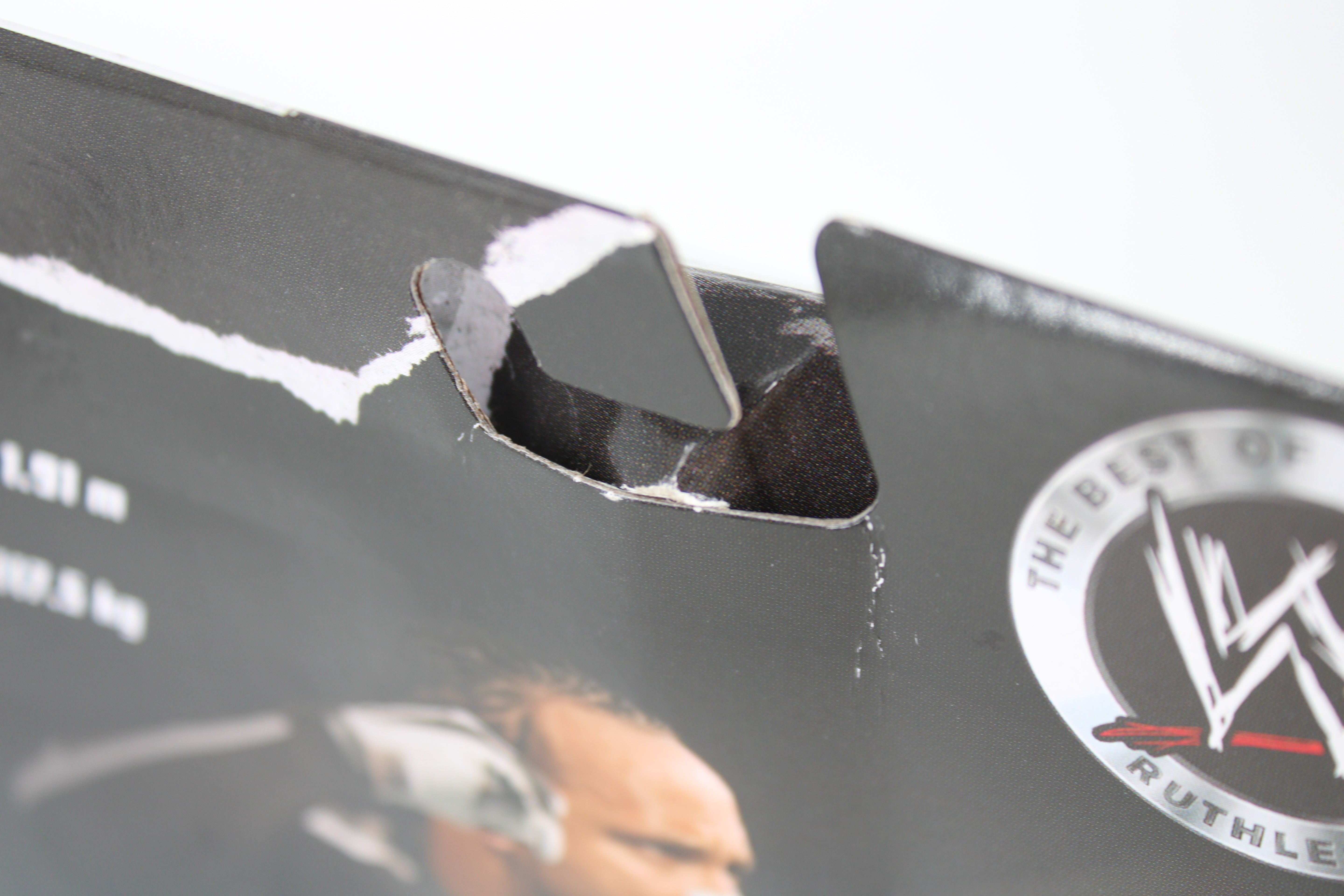 MVP WWE Elite Collection Best of Ruthless Aggression Action Figure — Package Detail Showing Hang Tab and Ruthless Aggression Logo Close-Up