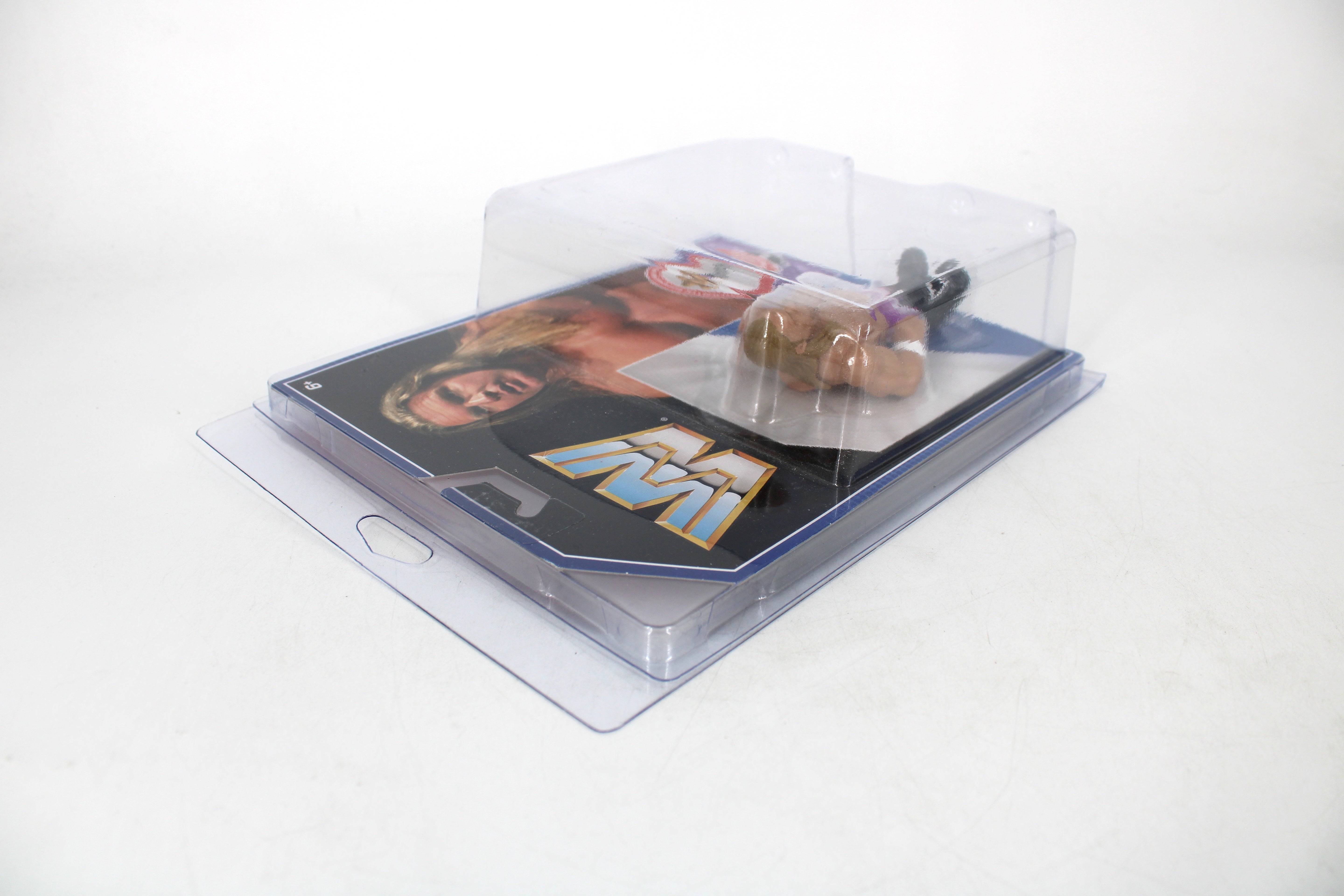 Triple H WWE Retro Series Action Figure — Angled Front View in Protective Case with Mattel Logo Card Art