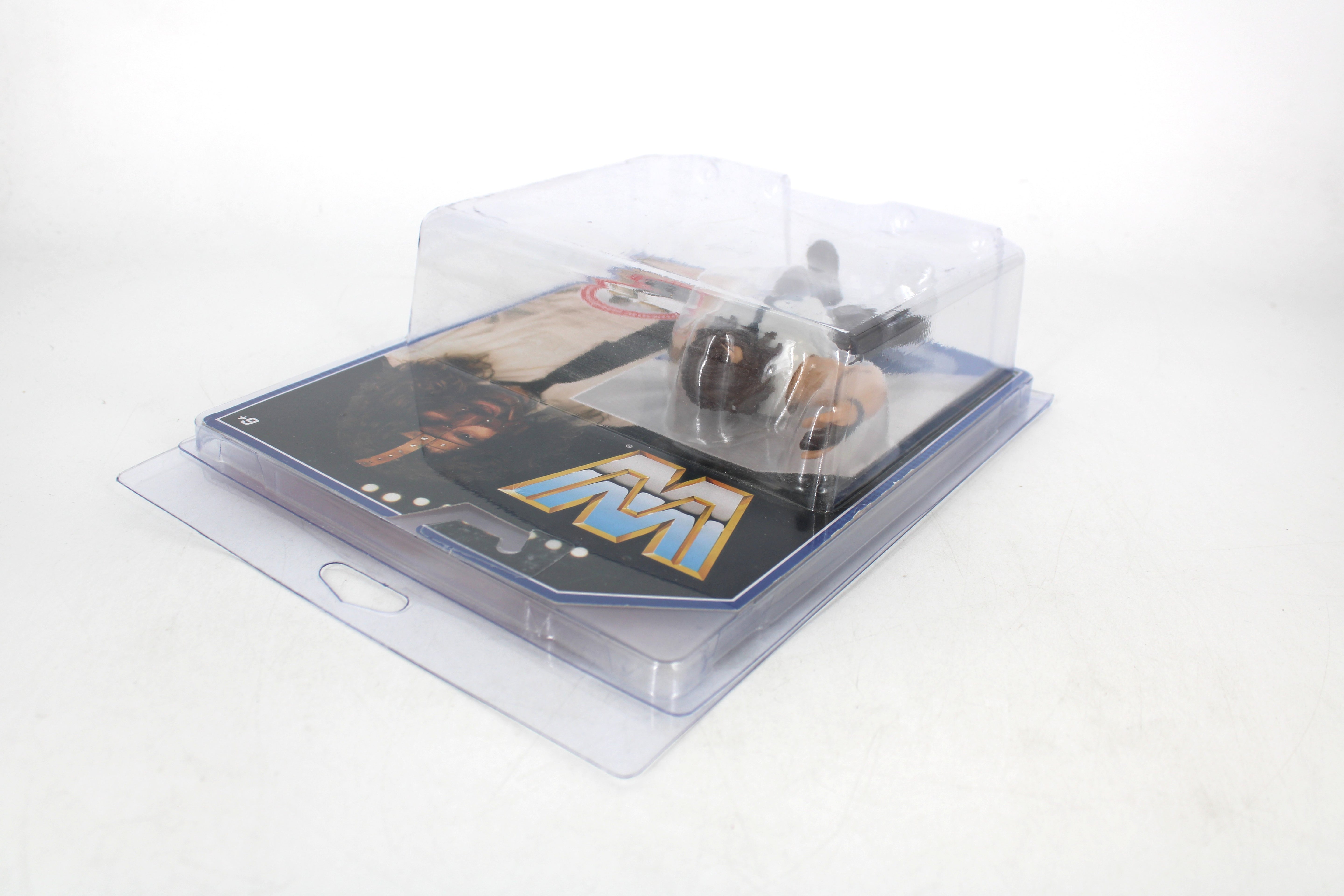 Mankind (Mick Foley) WWE Retro Action Figure — Side View Showing WWE Mattel Logo Card Art and Figure in Protective Case